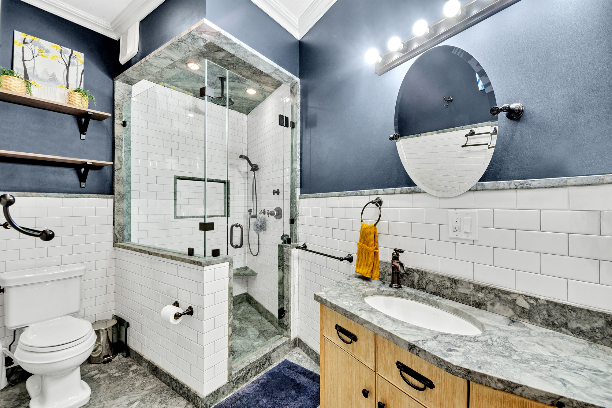 10 Carroll Street Brooklyn, NY 11231 - Photo 9 of 28 a bathroom with a granite countertop sink and a mirror