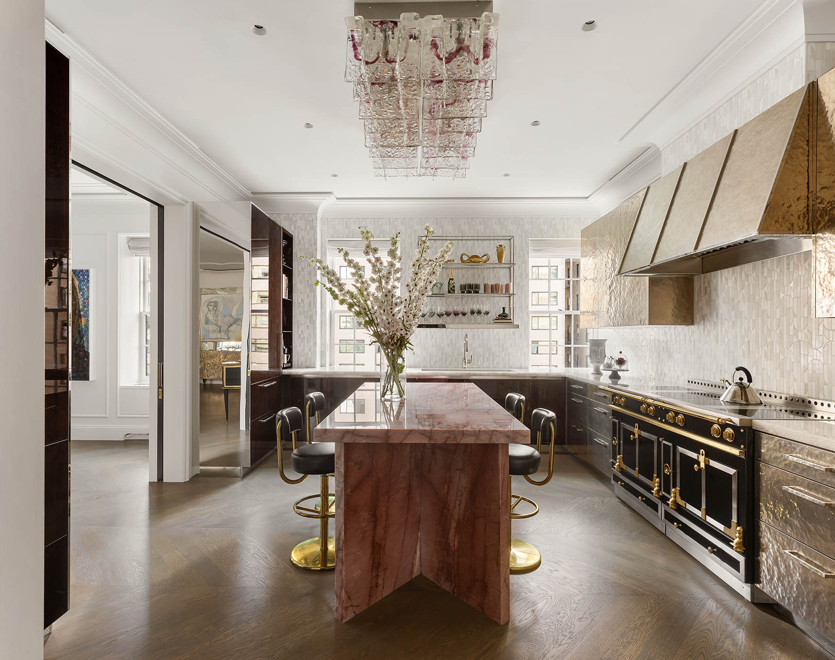 535 Park Avenue, Unit 8AB Manhattan, NY 10065 - Photo 4 of 20 a kitchen with stainless steel appliances granite countertop a sink stove and refrigerator