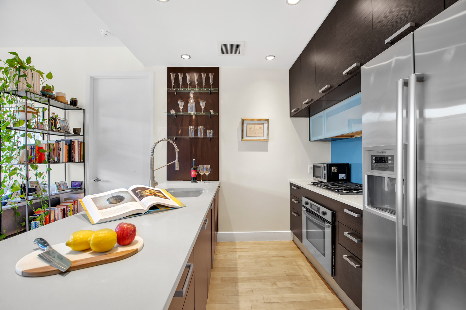309 2nd Street, Unit 3E Brooklyn, NY 11215 - Photo 6 of 11 a kitchen with stainless steel appliances granite countertop a refrigerator and a sink
