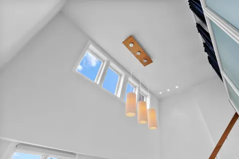 a room with furniture and a window