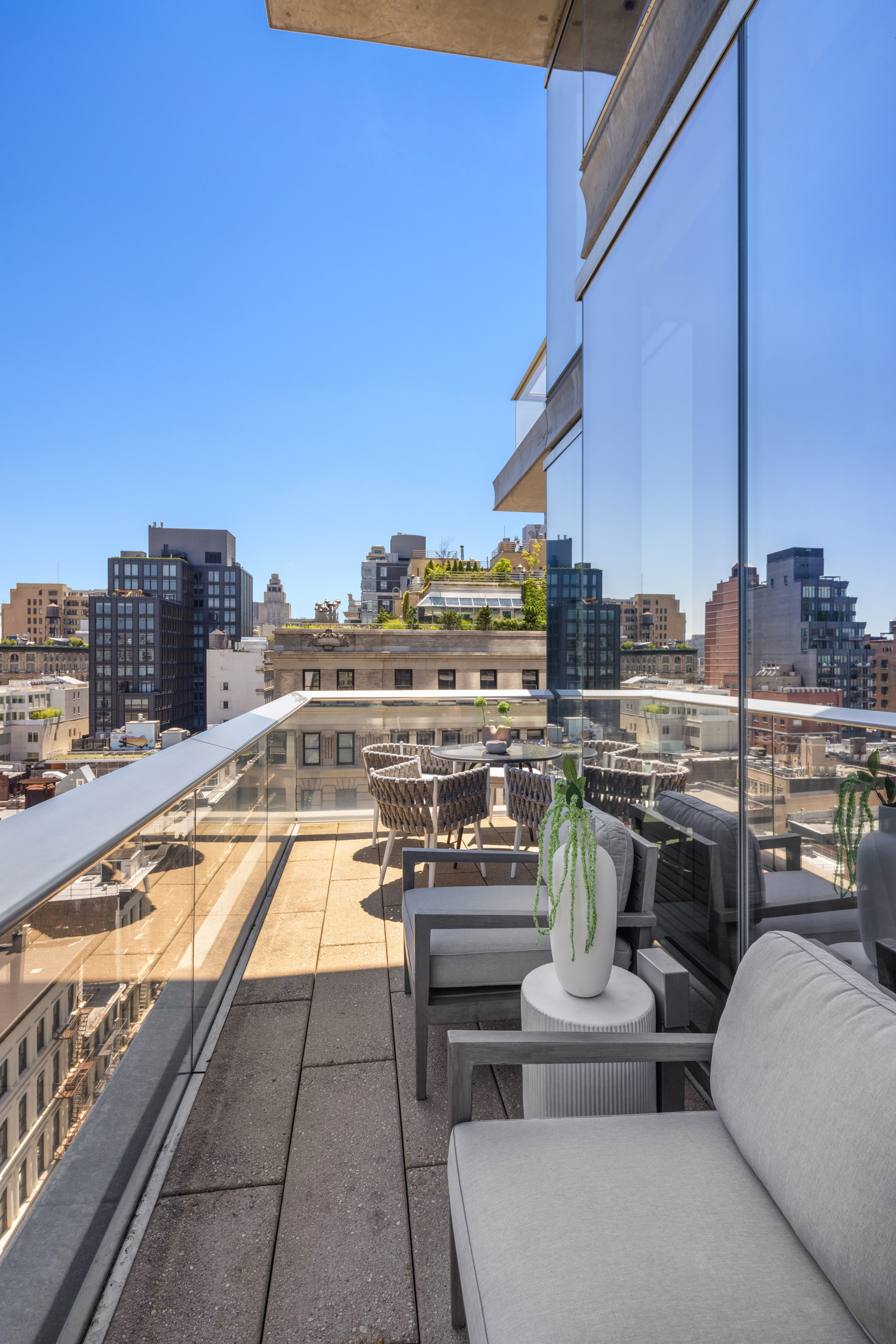 56 Leonard Street, Unit 14BEAST Manhattan, NY 10013 - Photo 22 of 35 a view of a balcony with furniture