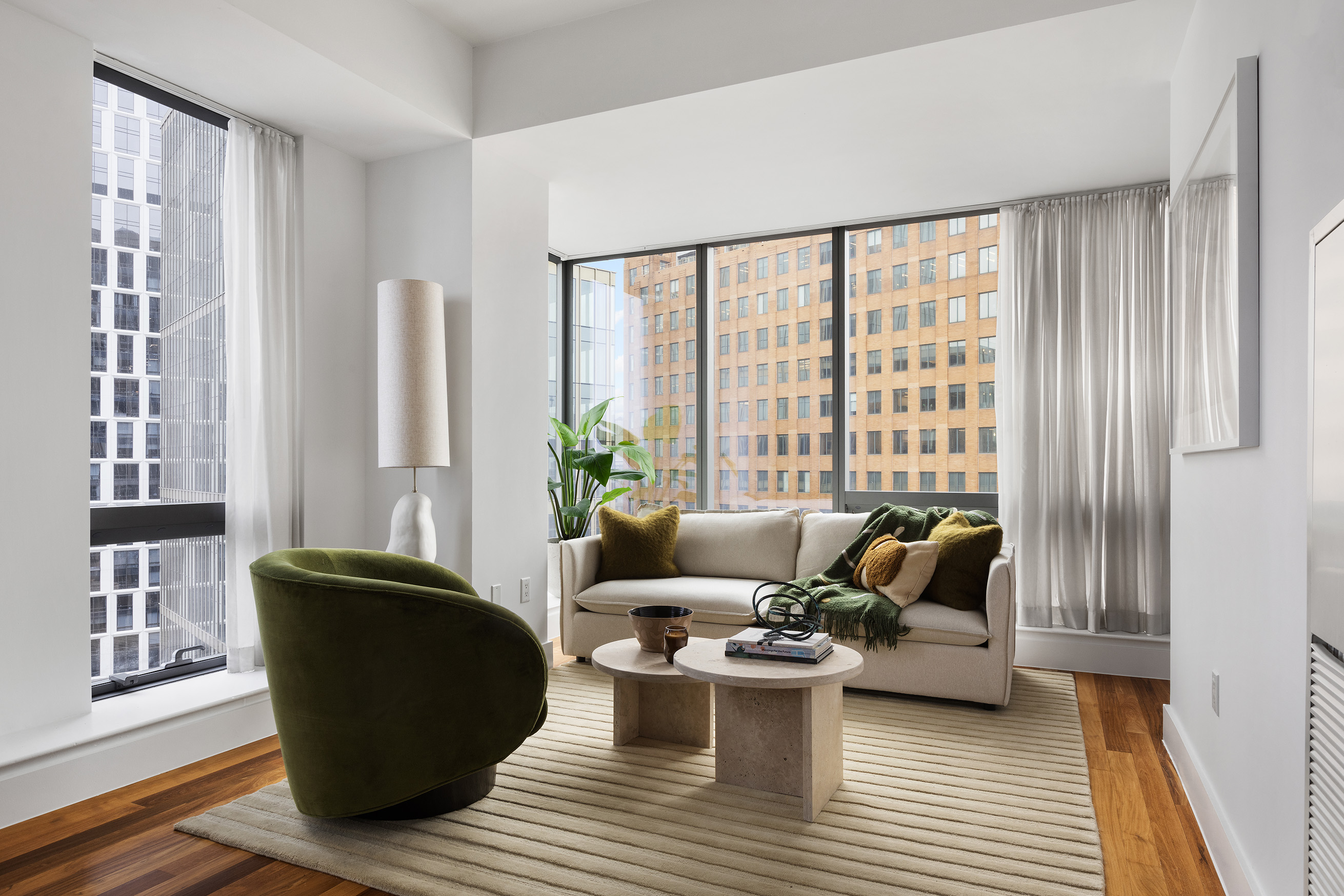 150 Myrtle Avenue, Unit 2506 Brooklyn, NY 11201 - Photo 5 of 16 a living room with furniture and a large window