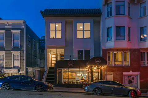 a car parked in front of a building