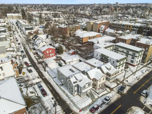 an aerial view of a city with lots of residential buildings