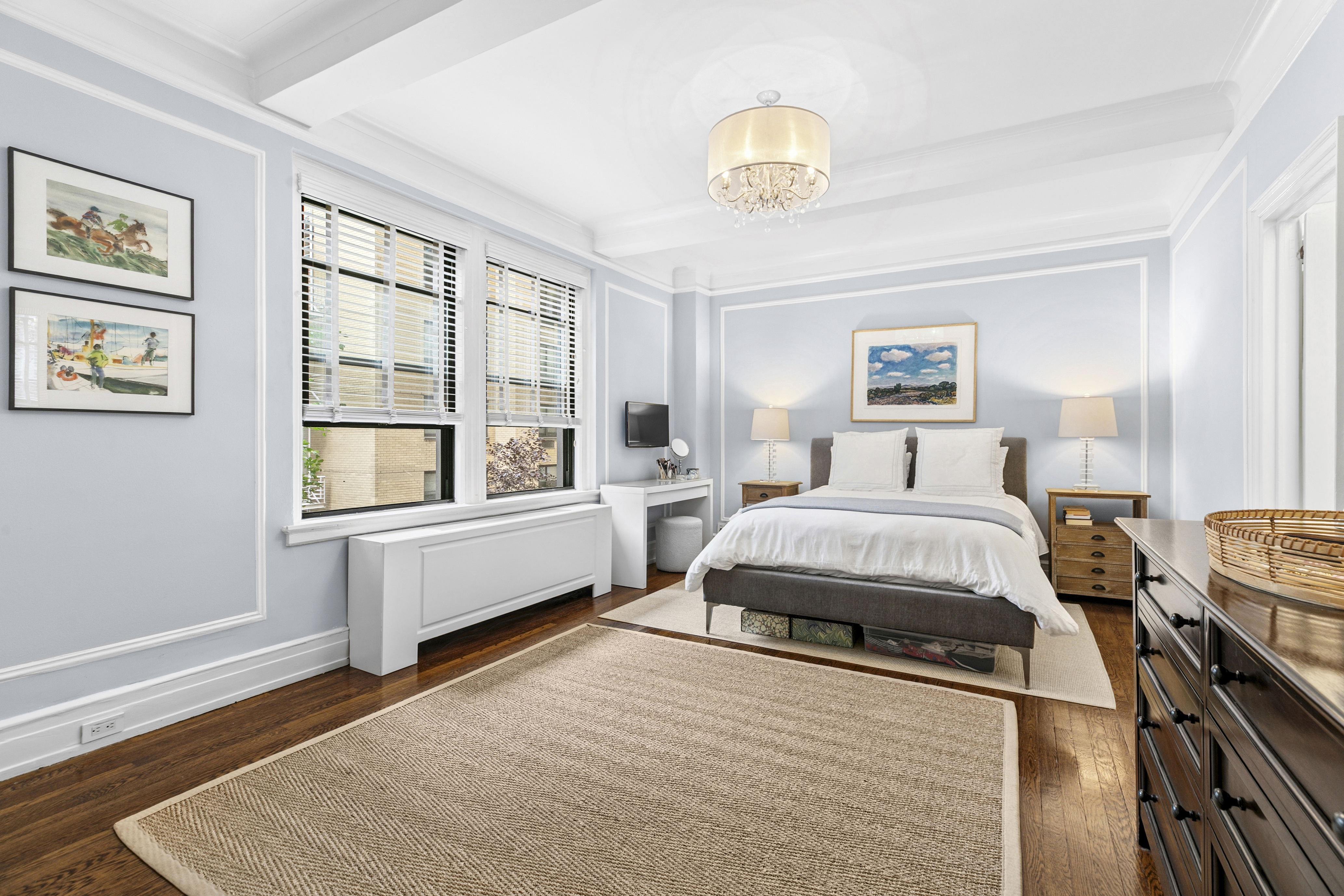 175 East 79th Street, Unit 3D Manhattan, NY 10075 - Photo 4 of 8 a spacious bedroom with a bed and a large window