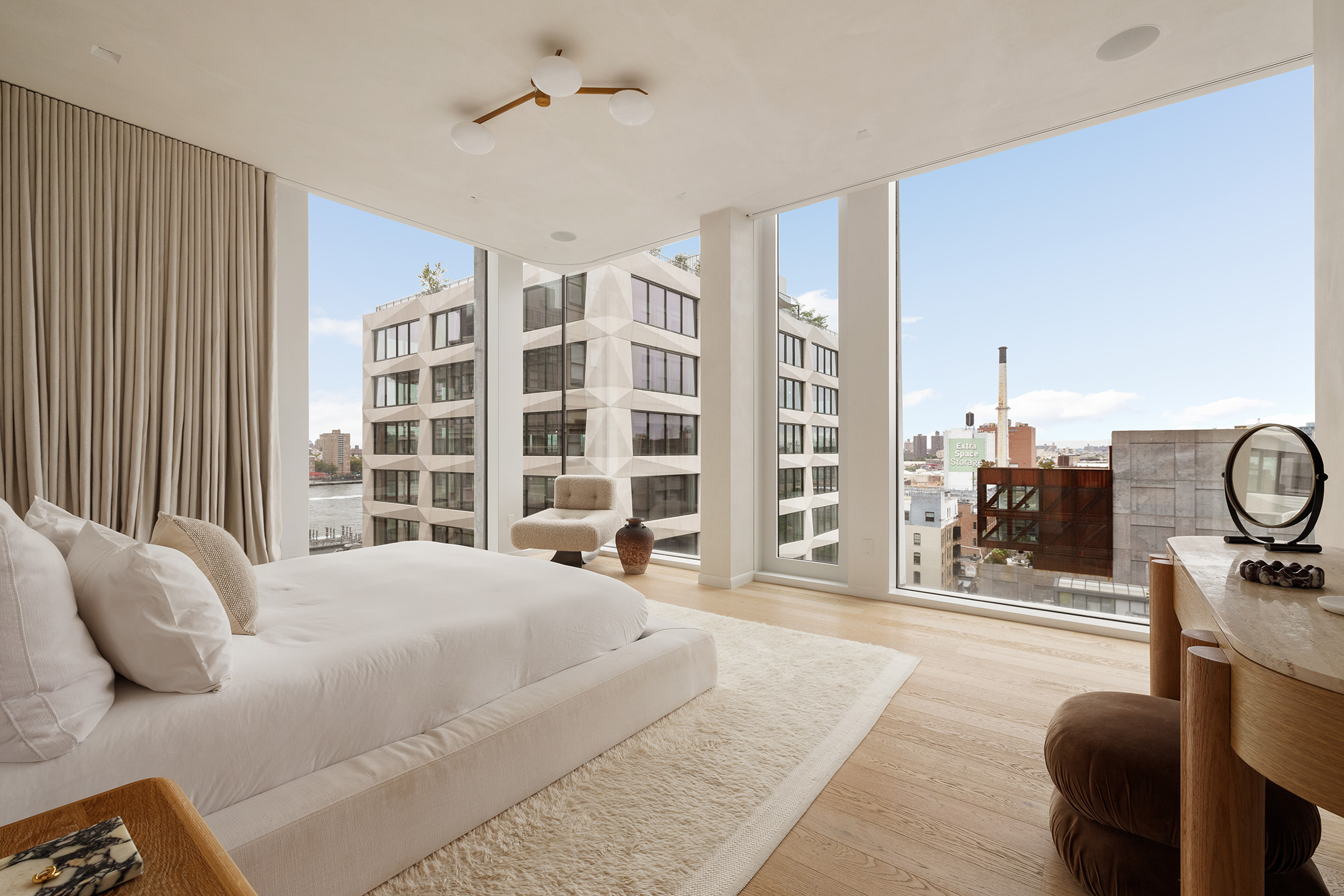 168 Plymouth Street, Unit PHA Brooklyn, NY 11201 - Photo 12 of 21 a large bedroom with a large bed and a window