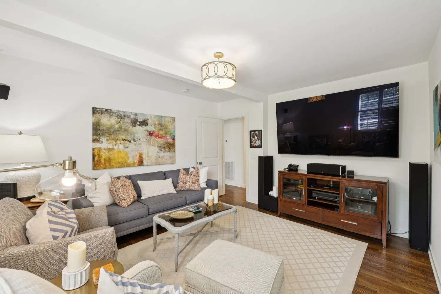 a bathroom with a shower sink and mirror