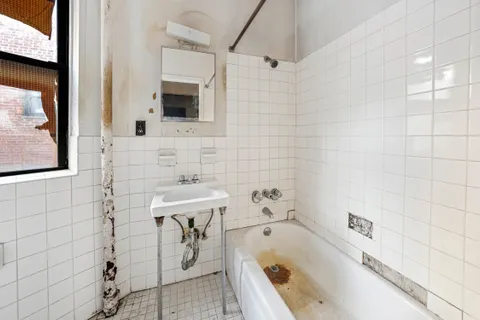 a bathroom with a sink and a bathtub