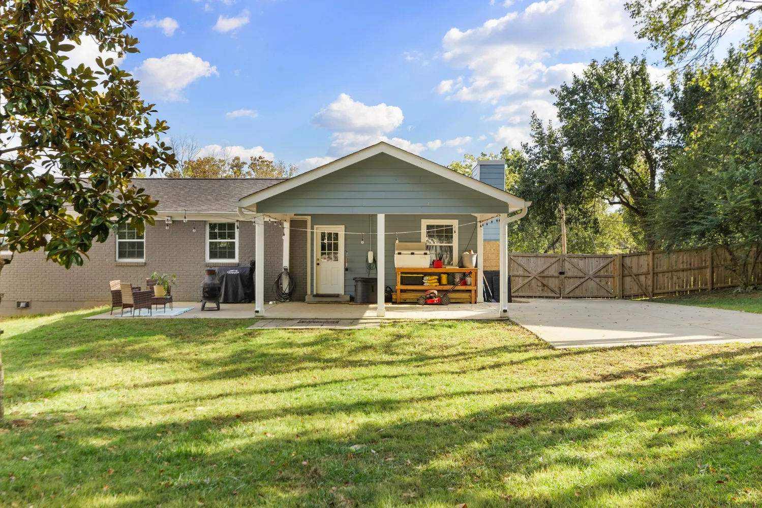 front view of a house with a yard