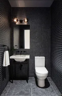 a living room with stainless steel appliances kitchen island granite countertop furniture a rug and a window