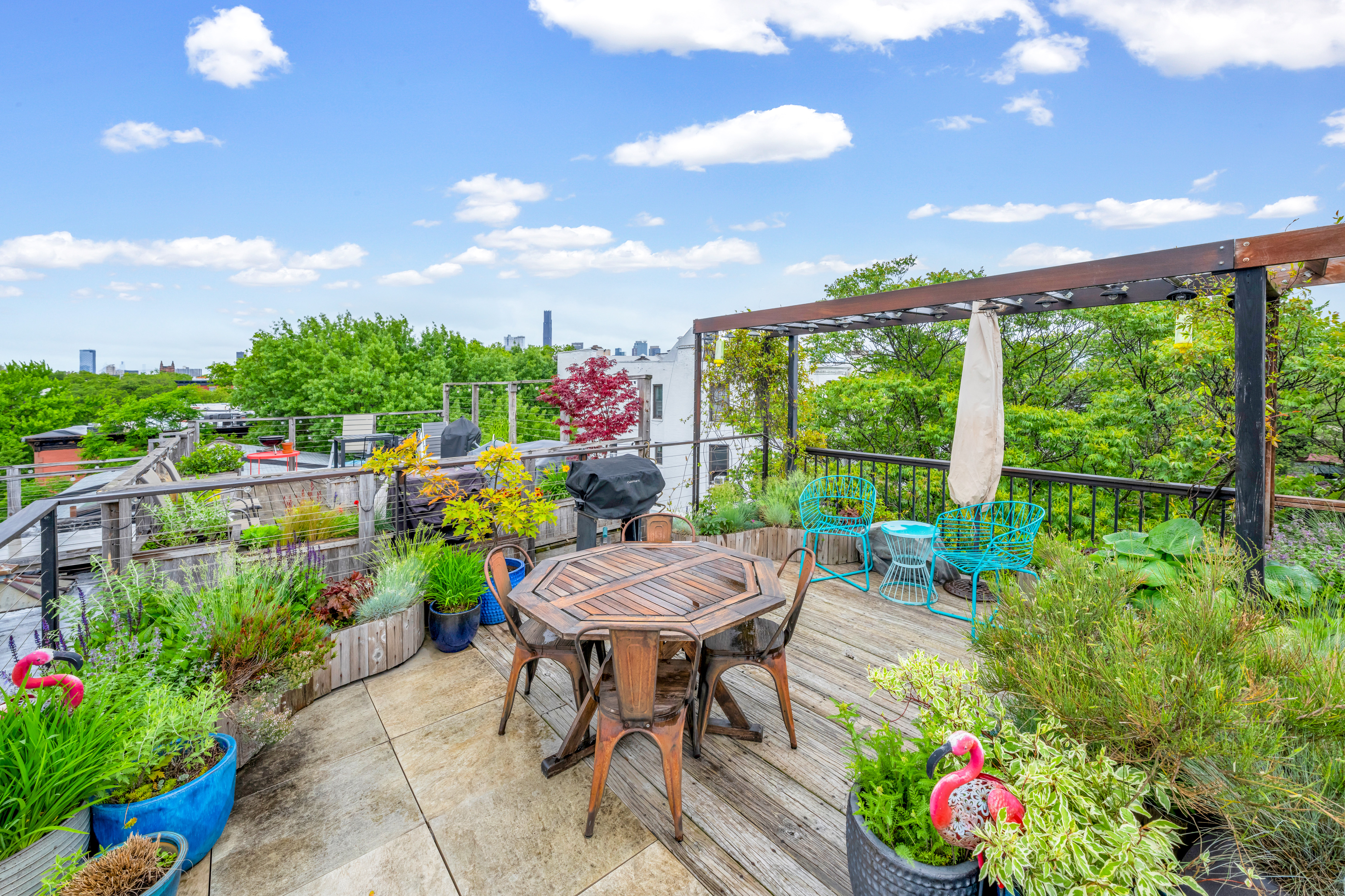 535 Clinton Street, Unit 4A Brooklyn, NY 11231 - Photo 6 of 10 a view of a chairs and table in a backyard