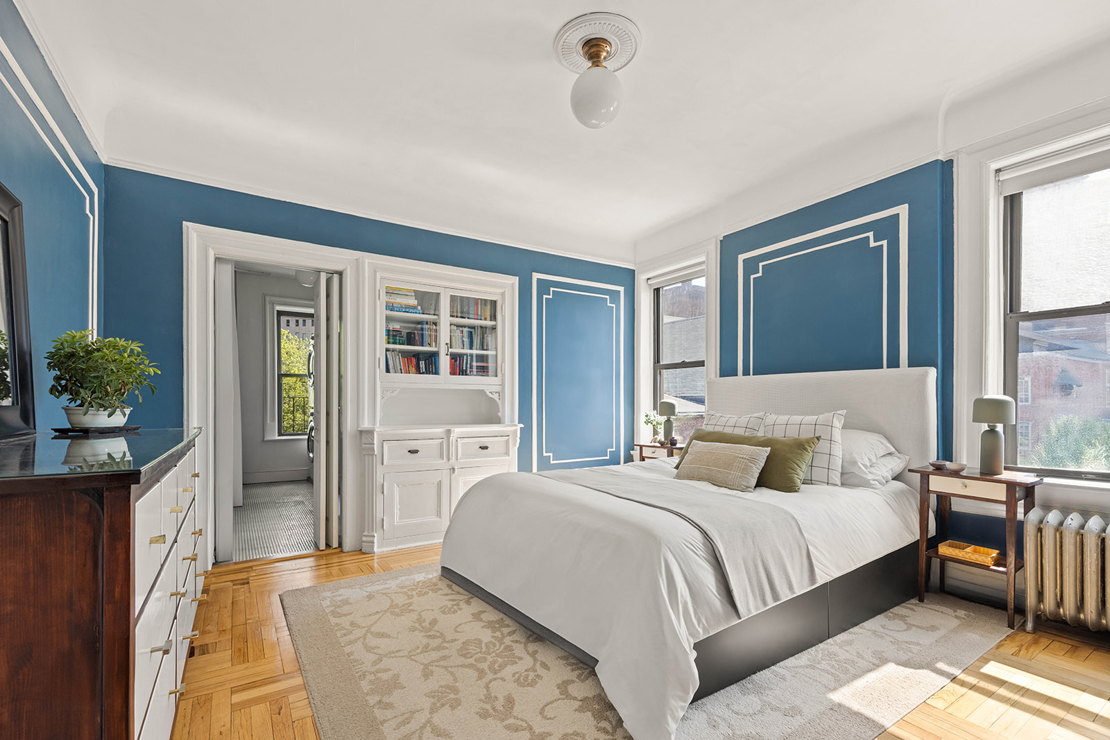 457 State Street, Unit 4BC Brooklyn, NY 11217 - Photo 5 of 13 a bedroom with a bed and a potted plant