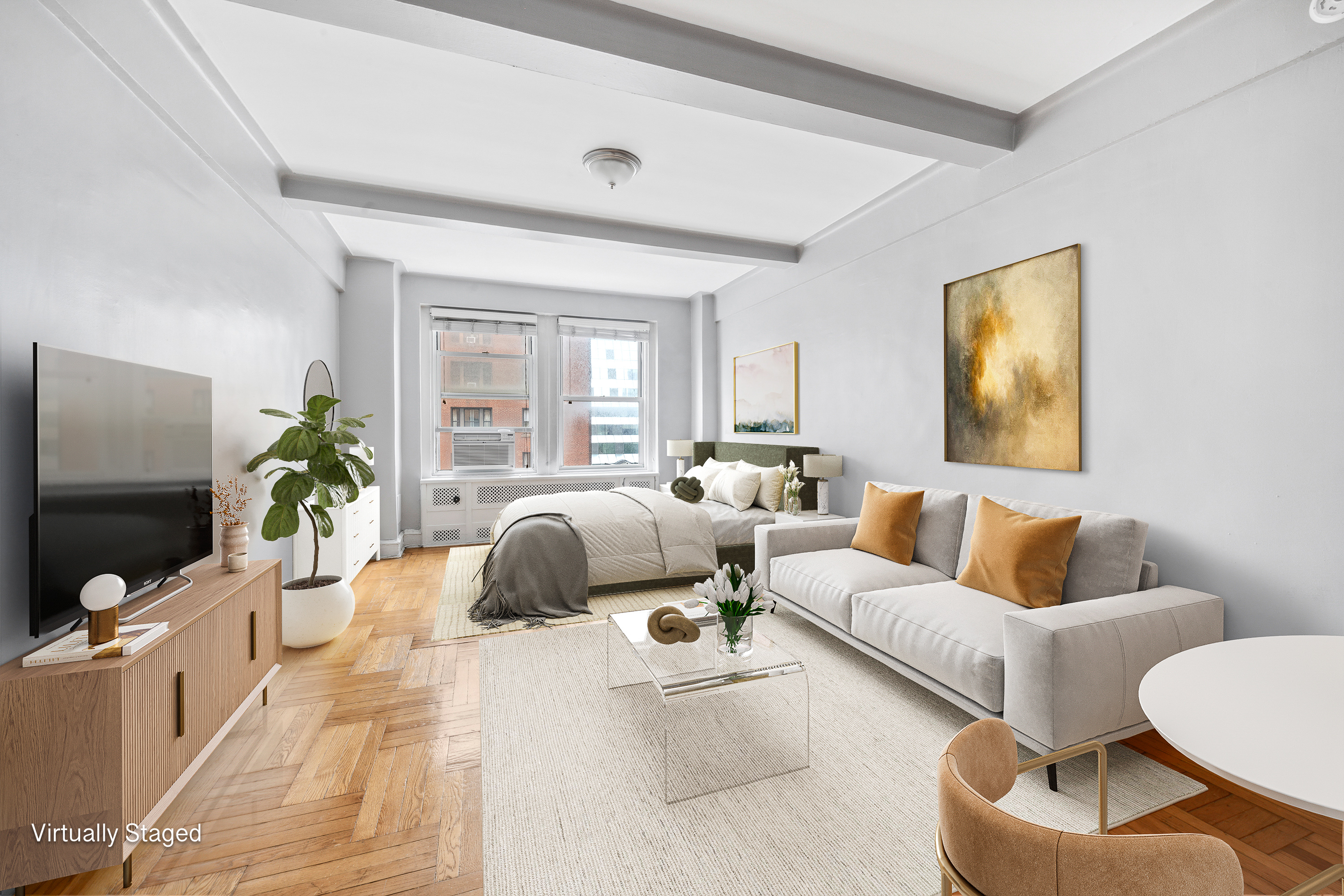 433 West 34th Street, Unit 8D Manhattan, NY 10001 - Photo 3 of 15 a living room with furniture and a flat screen tv