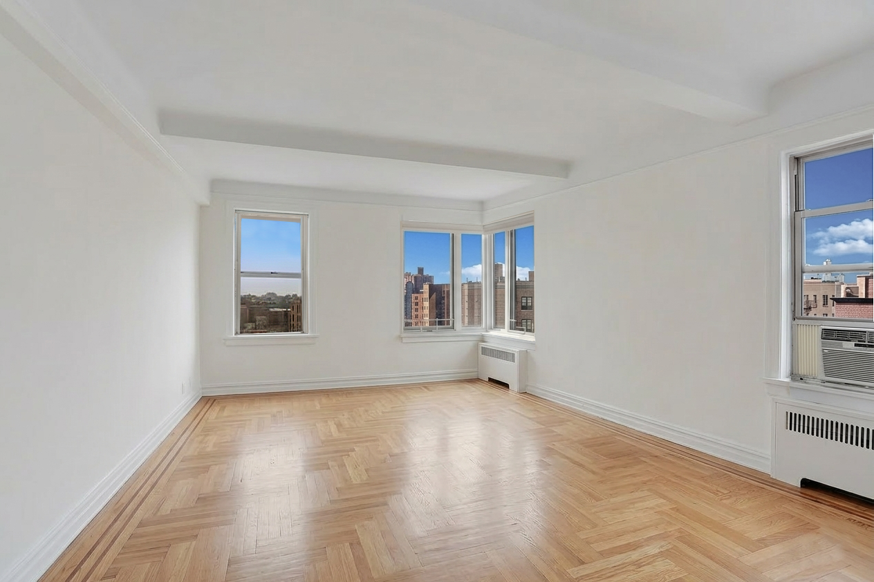 250 Cabrini Boulevard, Unit 9E Manhattan, NY 10033 - Photo 3 of 19 a view of empty room with wooden floor and fan