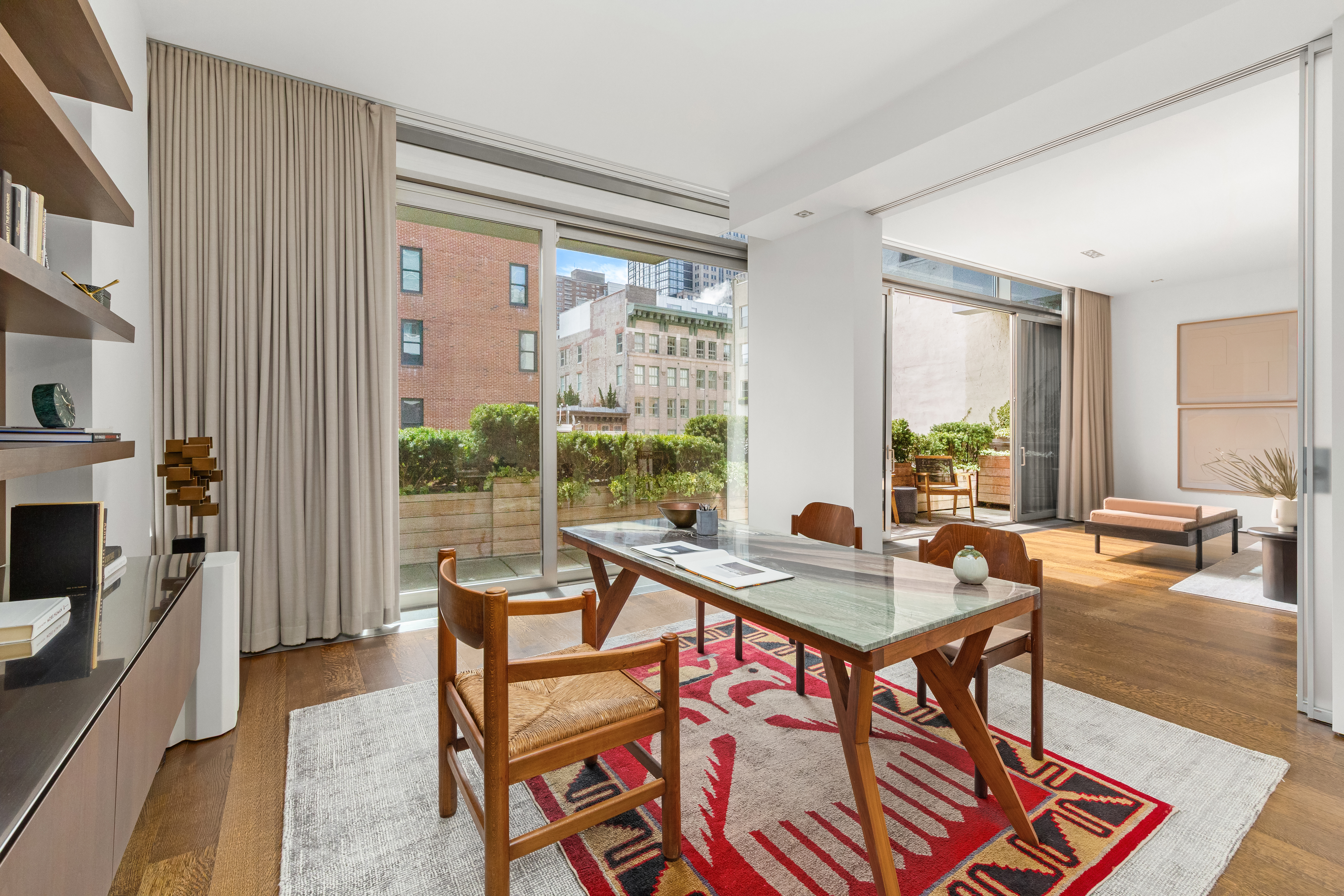 33 Vestry Street Manhattan, NY 10013 - Photo 11 of 16 a living room with furniture and a fireplace