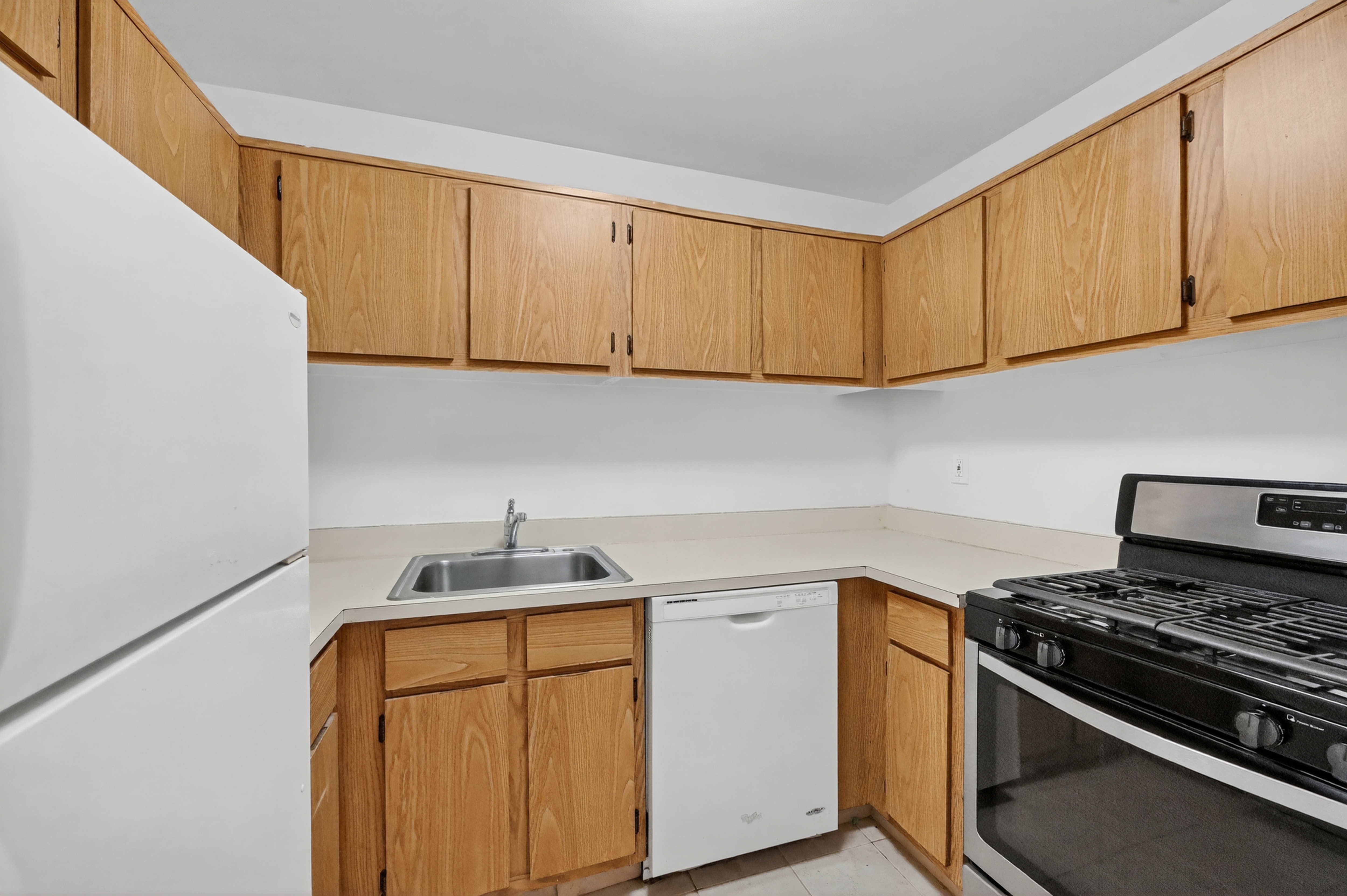 81 President Street, Unit 51-A Brooklyn, NY 11231 - Photo 16 of 27 a kitchen with stainless steel appliances granite countertop a sink stove and cabinets