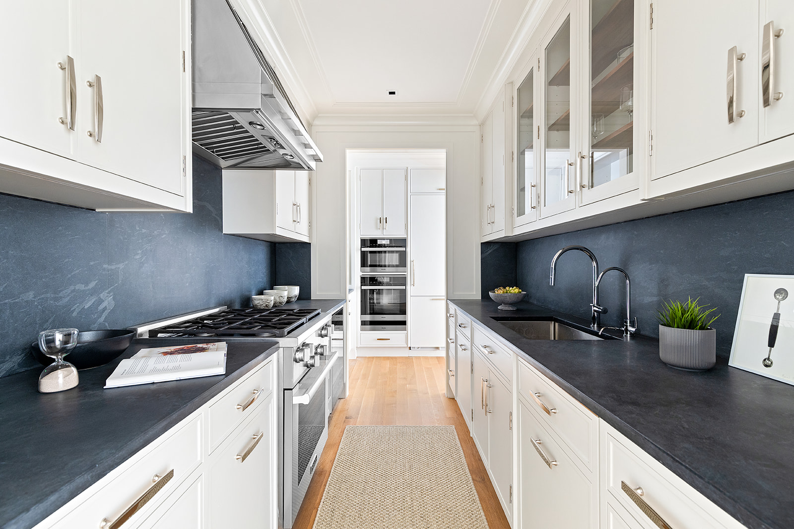 1045 Madison Avenue, Unit 3B Manhattan, NY 10075 - Photo 5 of 14 a kitchen with a sink and appliances