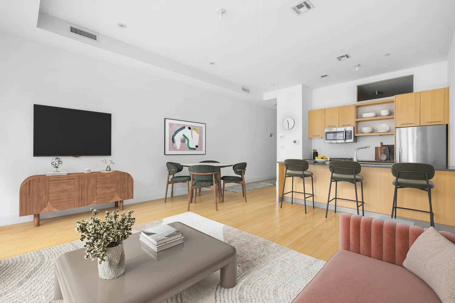a living room with furniture and a flat screen tv
