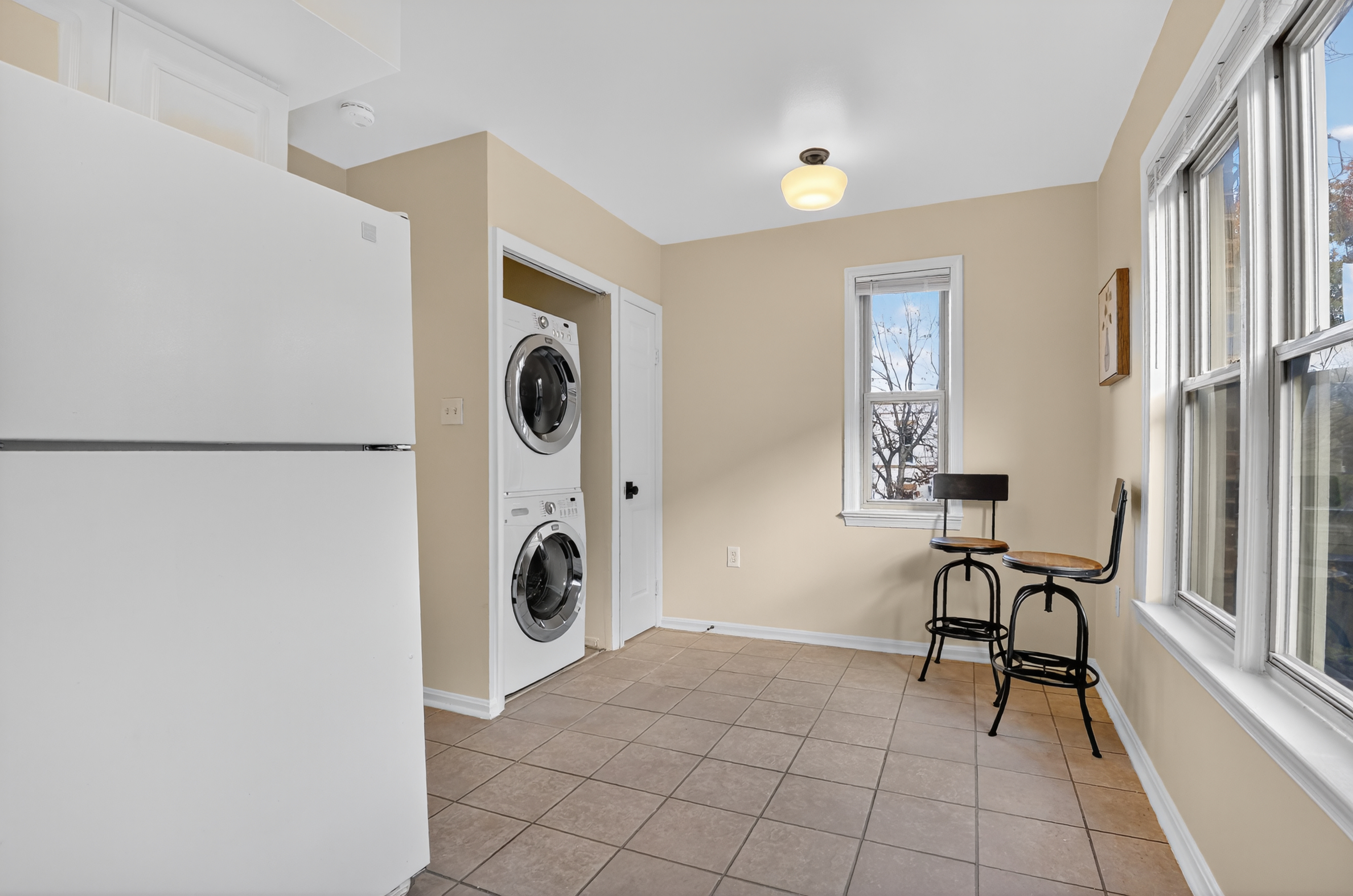 1493 15th Street Northeast, Unit 1493 Washington, DC 20002 - Photo 15 of 26 a view of a livingroom with furniture and a window