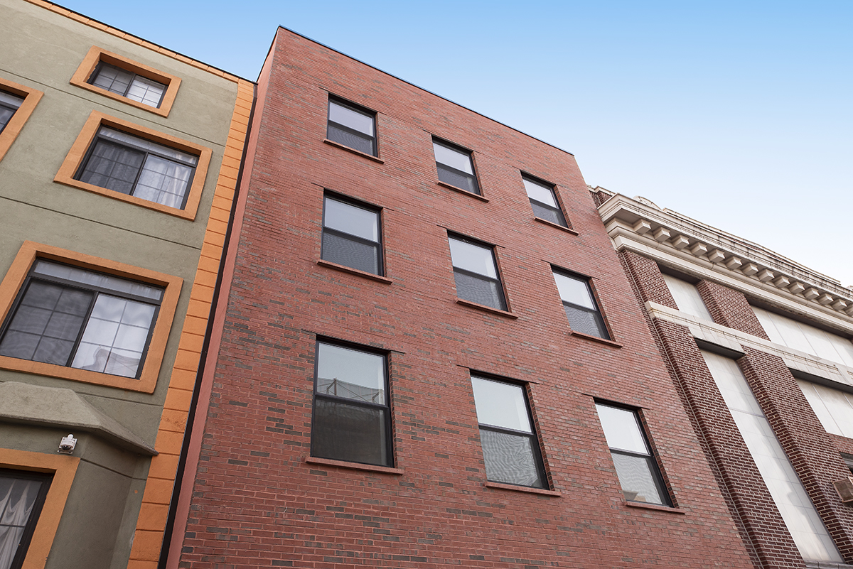 216 Boerum Street, Unit 3B Brooklyn, NY 11206 - Photo 9 of 10 a front view of a building