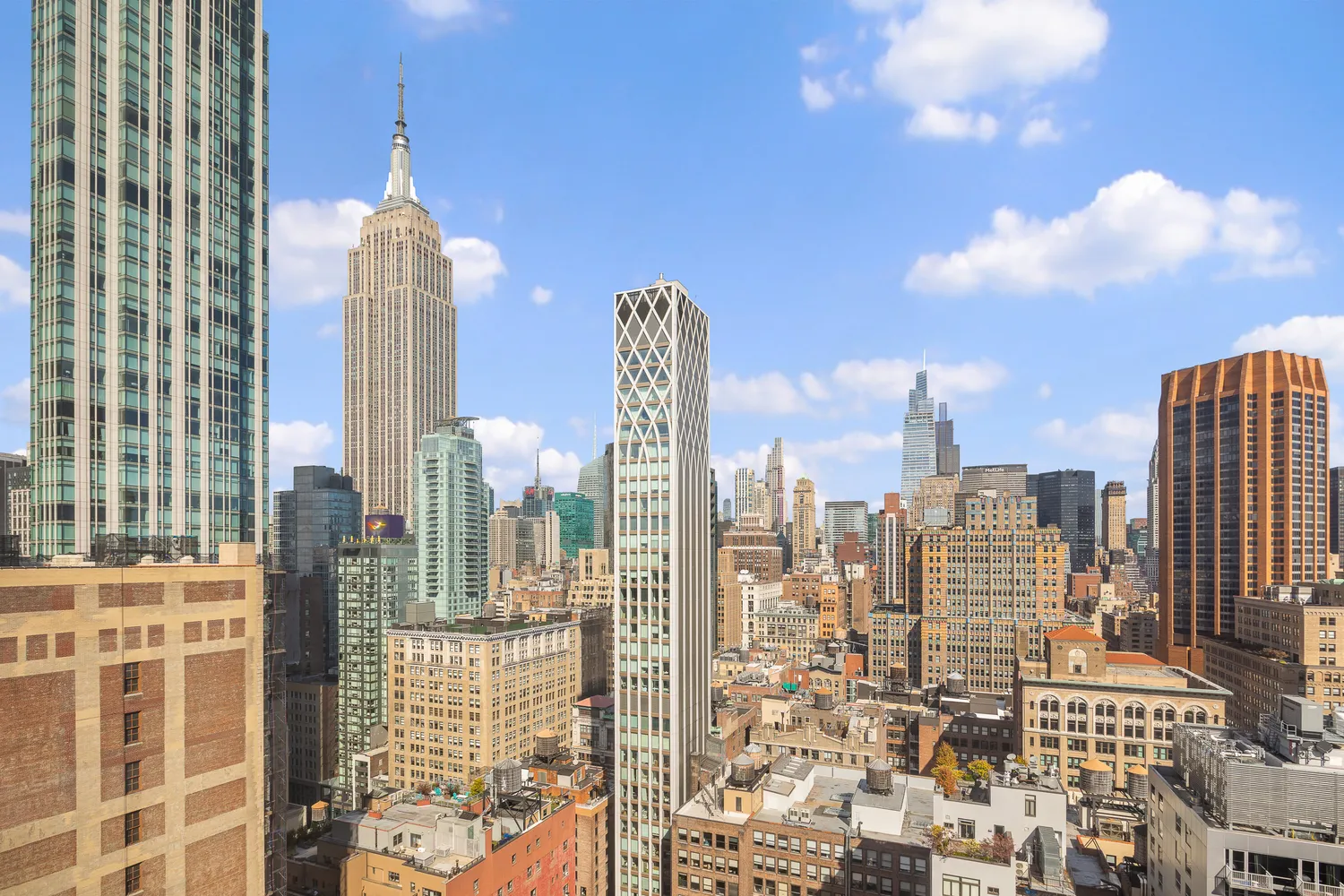 a view of a city with tall buildings