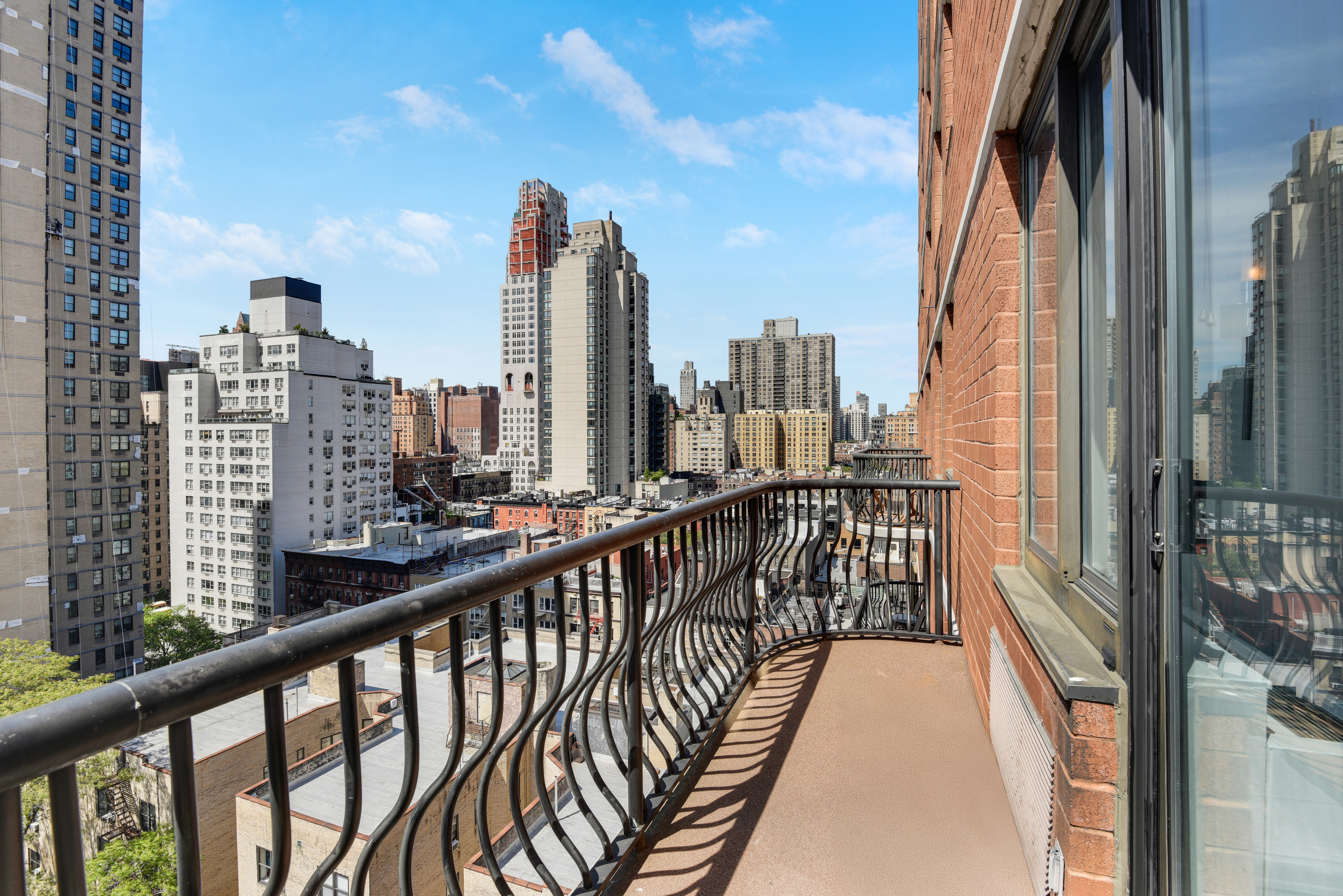 343 East 74th Street, Unit 15D Manhattan, NY 10021 - Photo 11 of 14 a view of balcony with city