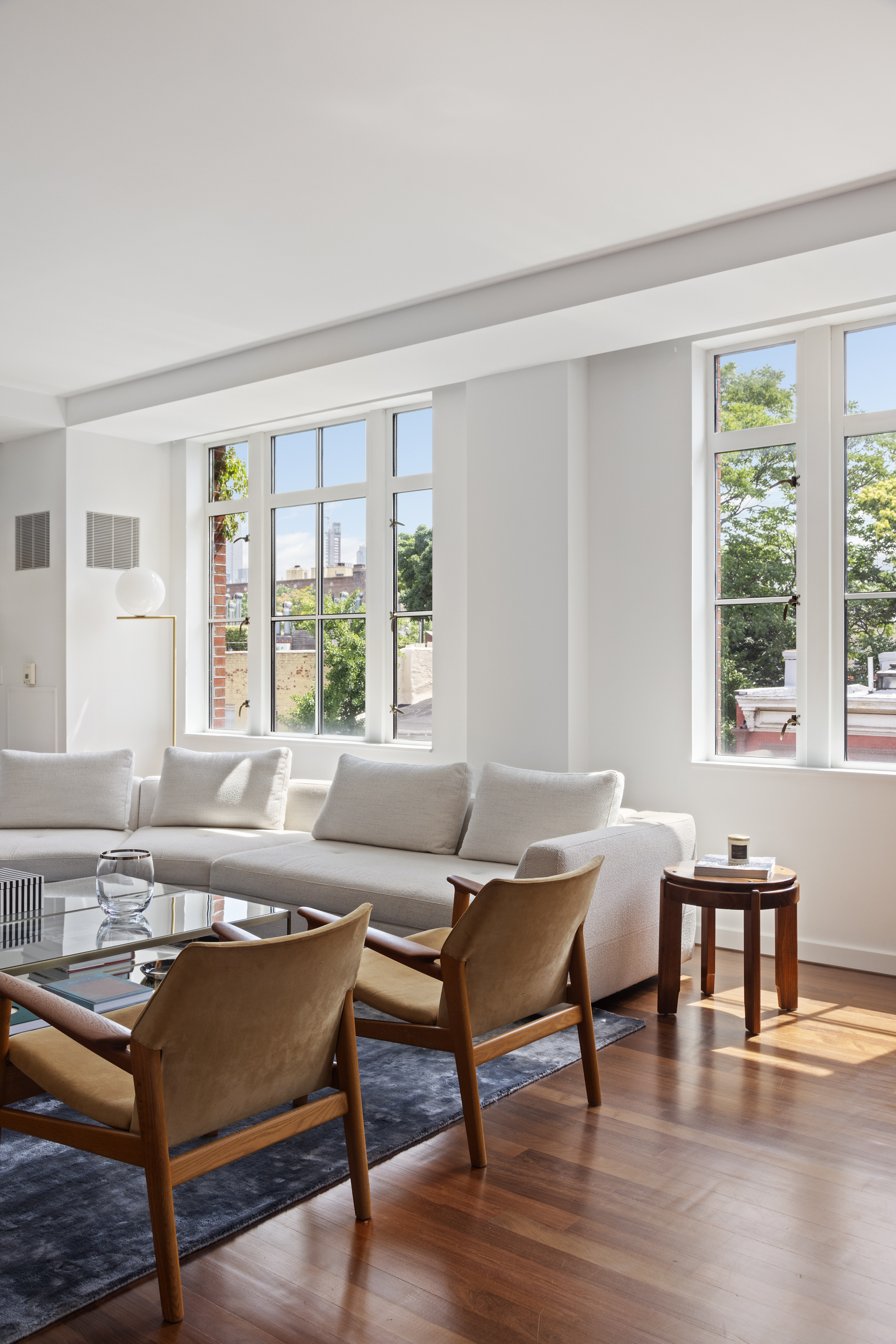 744 Greenwich Street, Unit 4 Manhattan, NY 10014 - Photo 17 of 34 a living room with furniture and a window