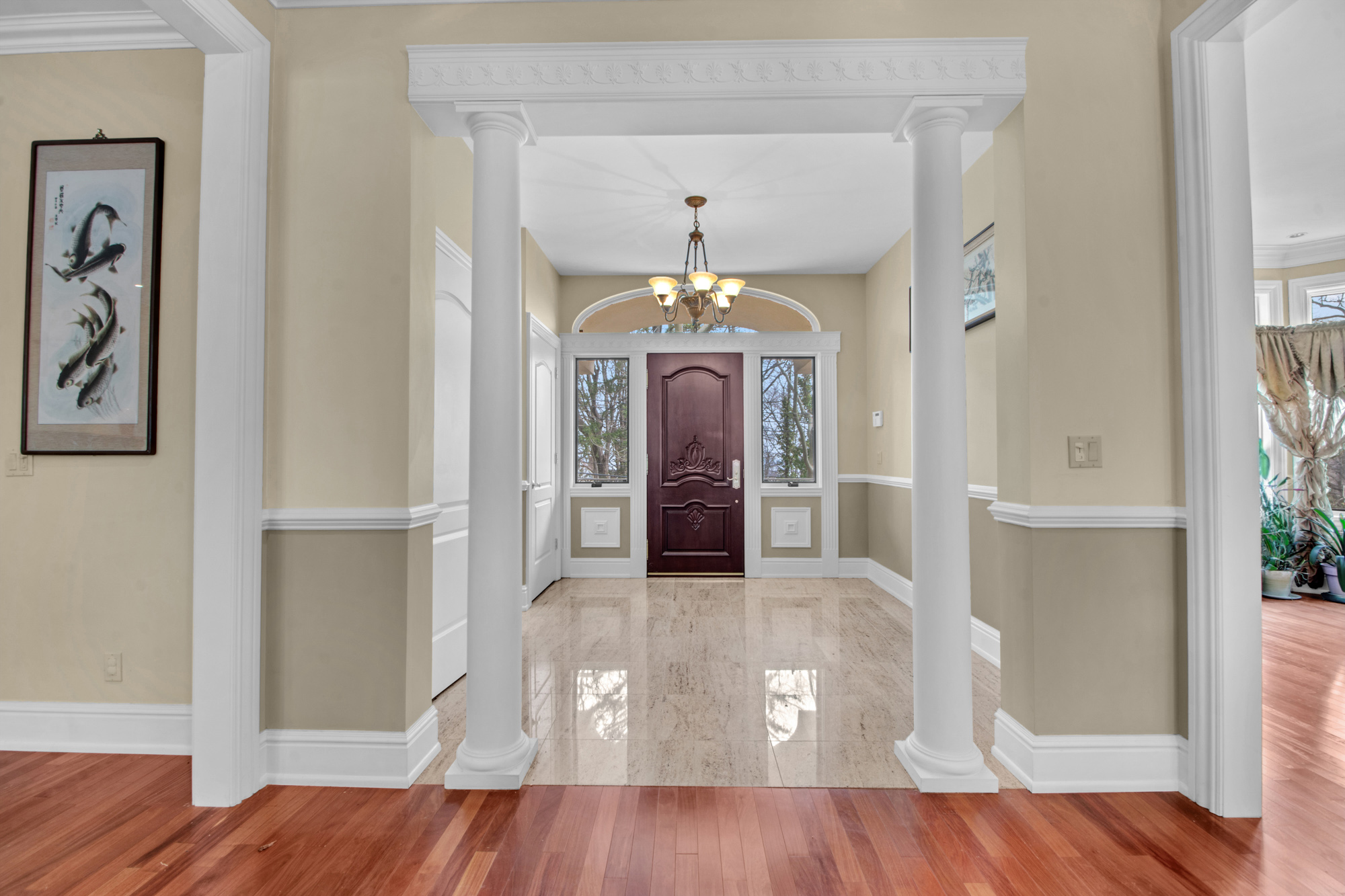 68 Circle Road Staten Island, NY 10304 - Photo 2 of 38 wooden floor in a hall with an entryway and wooden floor