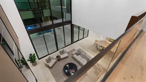 a view of living room and utility room