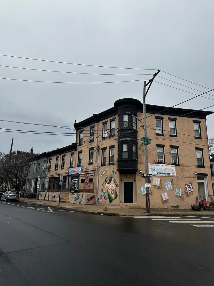a view of a street with cars