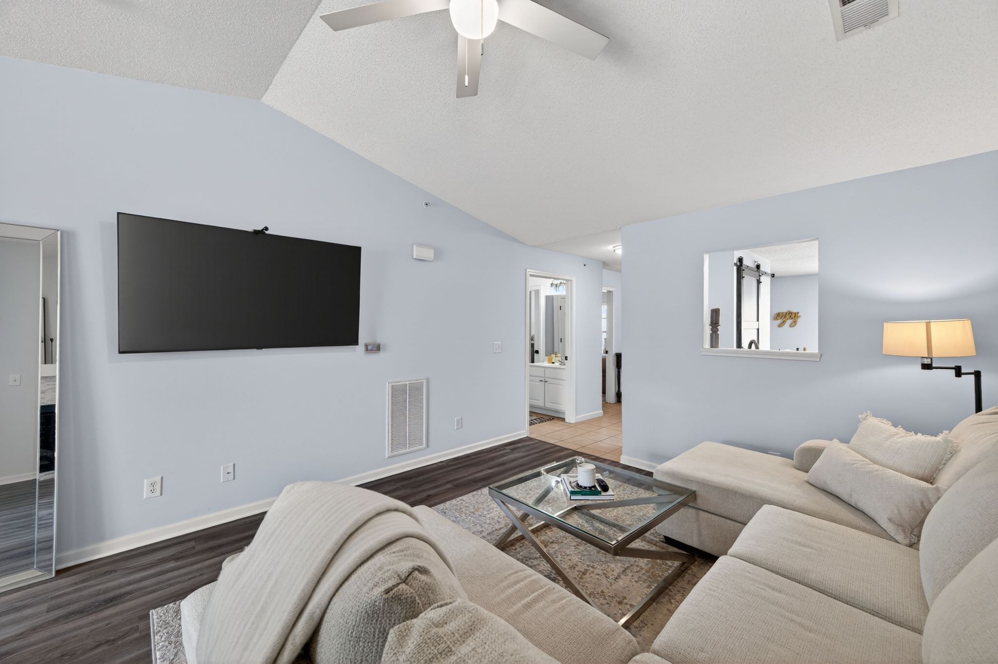 Huntscroft Lane Raleigh, NC 27617 - Photo 23 of 49 a bedroom with a bed and a flat screen tv