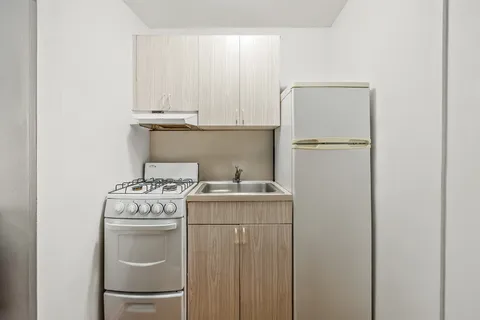 a utility room with washer and dryer