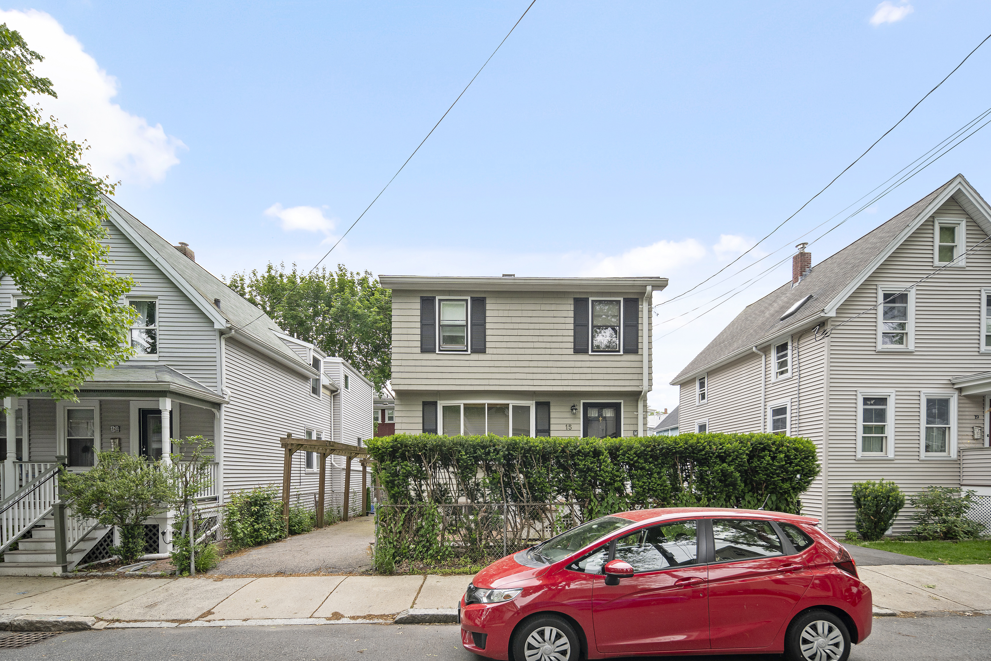 15 Harrington Road Cambridge, MA 02140 - Photo 16 of 17 a front view of a house with a yard