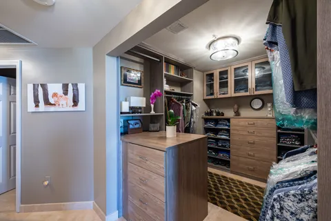 a view of kitchen center island and stainless steel appliances
