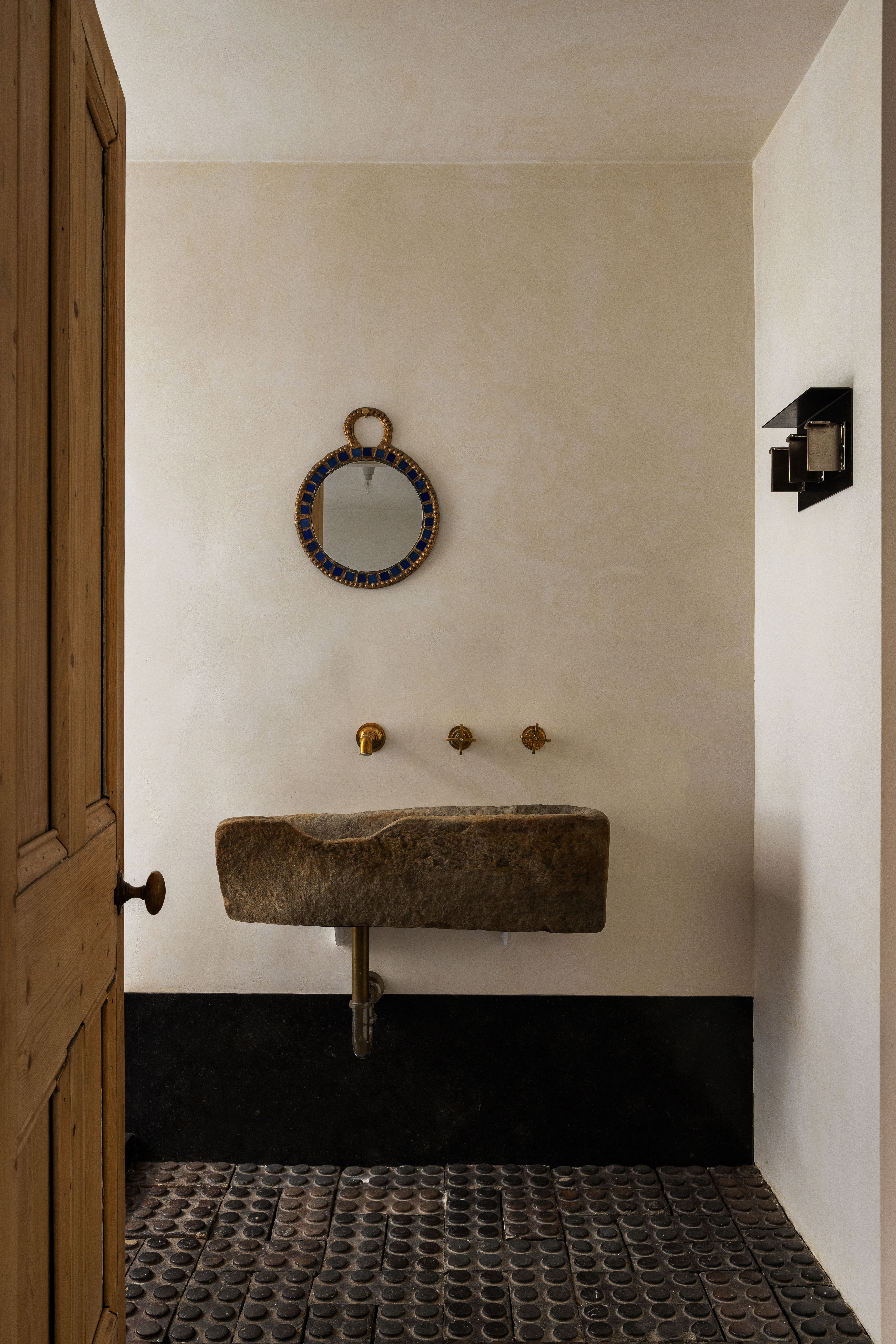 125 West 15th Street Manhattan, NY 10011 - Photo 14 of 28 a bathroom with a sink and a mirror