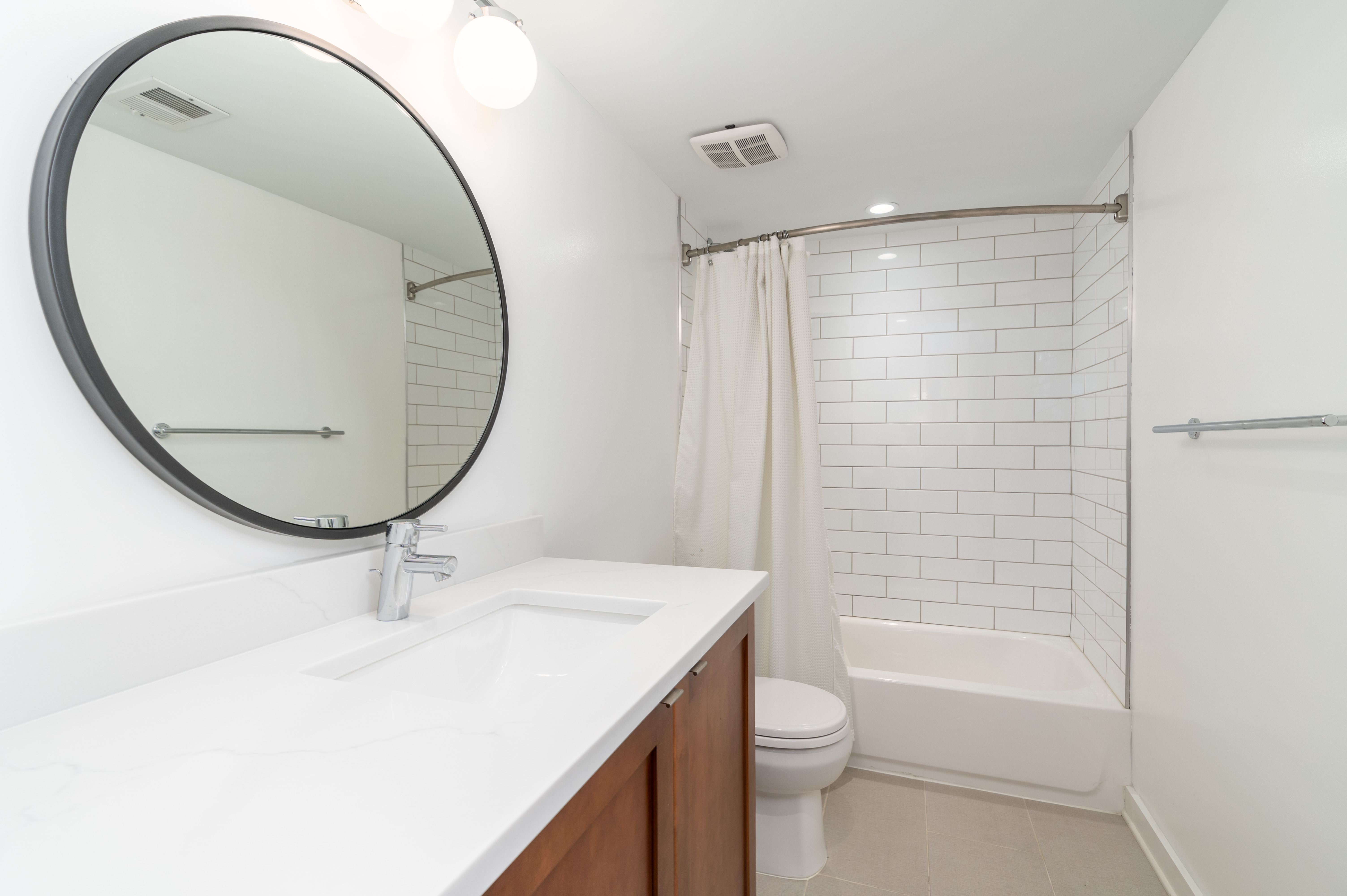1740 New Jersey Avenue Northwest, Unit 2 Washington, DC 20001 - Photo 25 of 35 a bathroom with a sink a toilet and a mirror