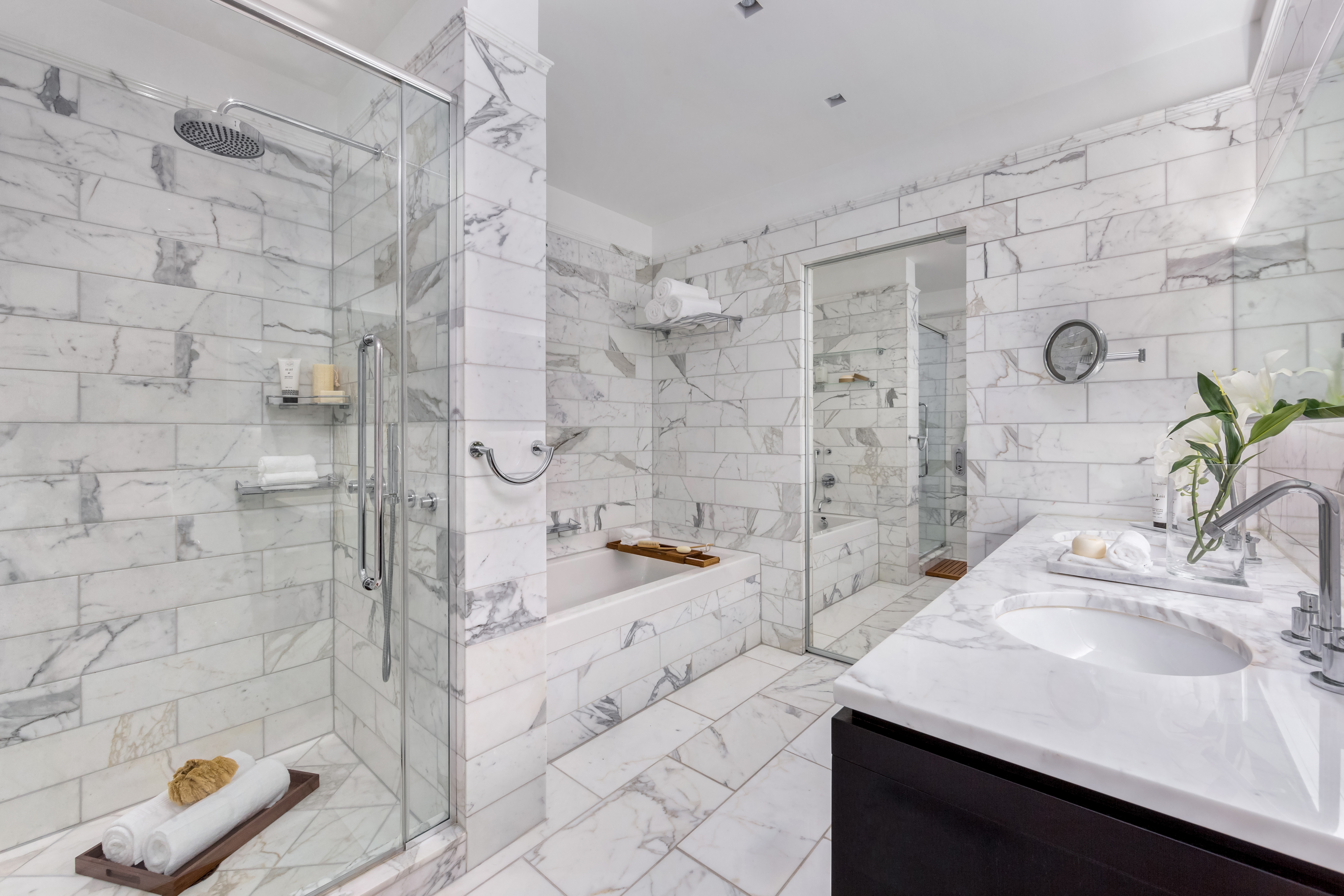 225 5th Avenue, Unit PHY Manhattan, NY 10010 - Photo 8 of 10 a bathroom with a sink and a shower