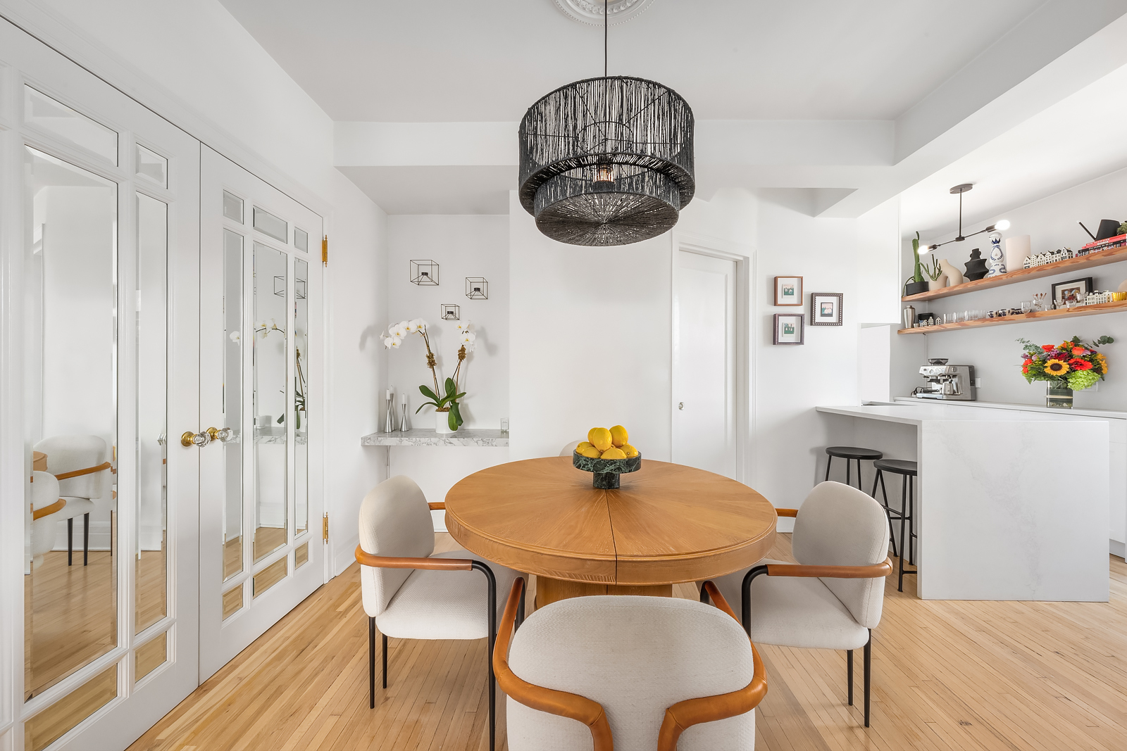365 West 20th Street, Unit 14B Manhattan, NY 10011 - Photo 6 of 21 a view of a dining room with furniture wooden floor and chandelier