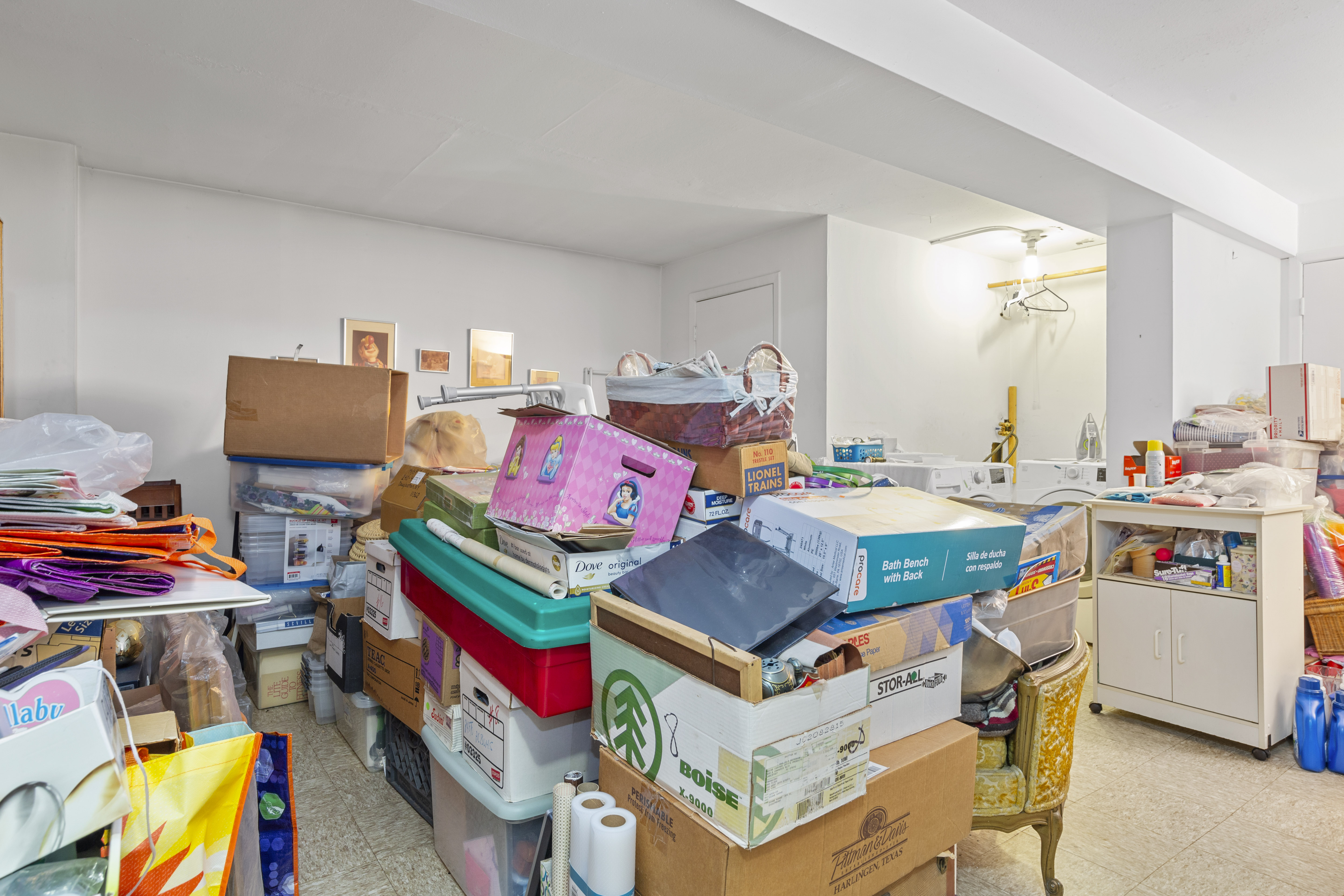 240-47 68th Avenue Queens, NY 11362 - Photo 29 of 39 a living room with furniture and a baby crib