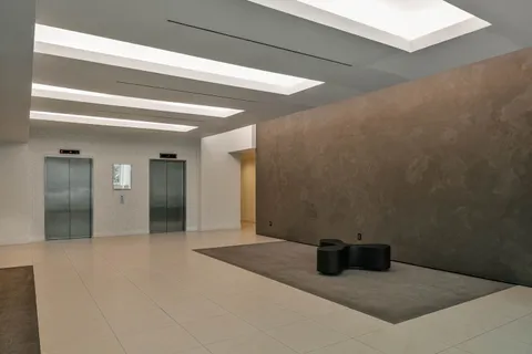 a view of a livingroom and entryway