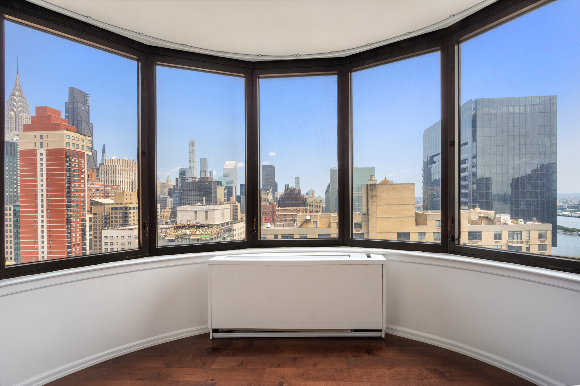 330 East 38th Street, Unit 41H Manhattan, NY 10016 - Photo 3 of 6 a view of a kitchen with a large window