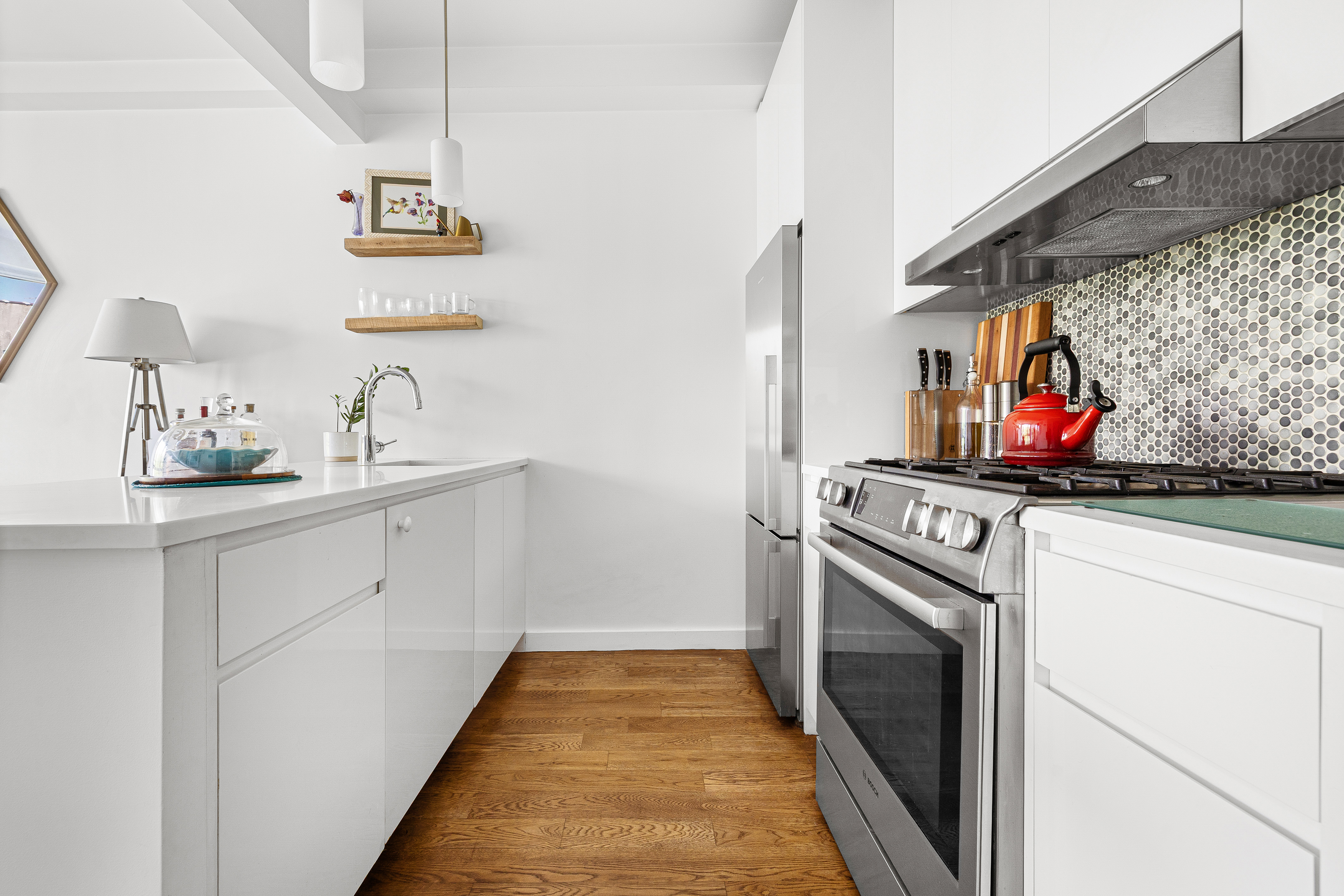 307 Cooper Street, Unit 3B Brooklyn, NY 11237 - Photo 5 of 10 a utility room with sink dryer and washer