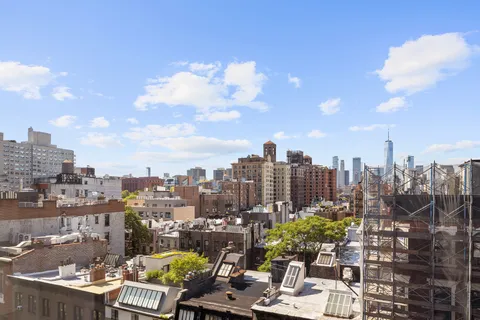a view of a city with tall buildings