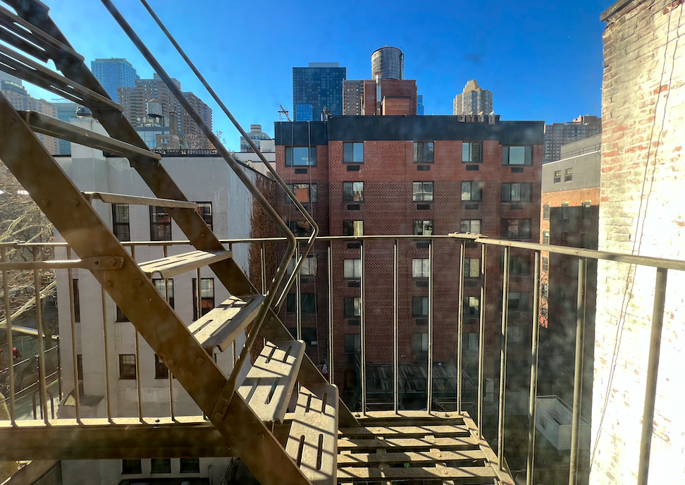 446 West 46th Street, Unit 16 Manhattan, NY 10036 - Photo 5 of 12 a view of a building from a balcony
