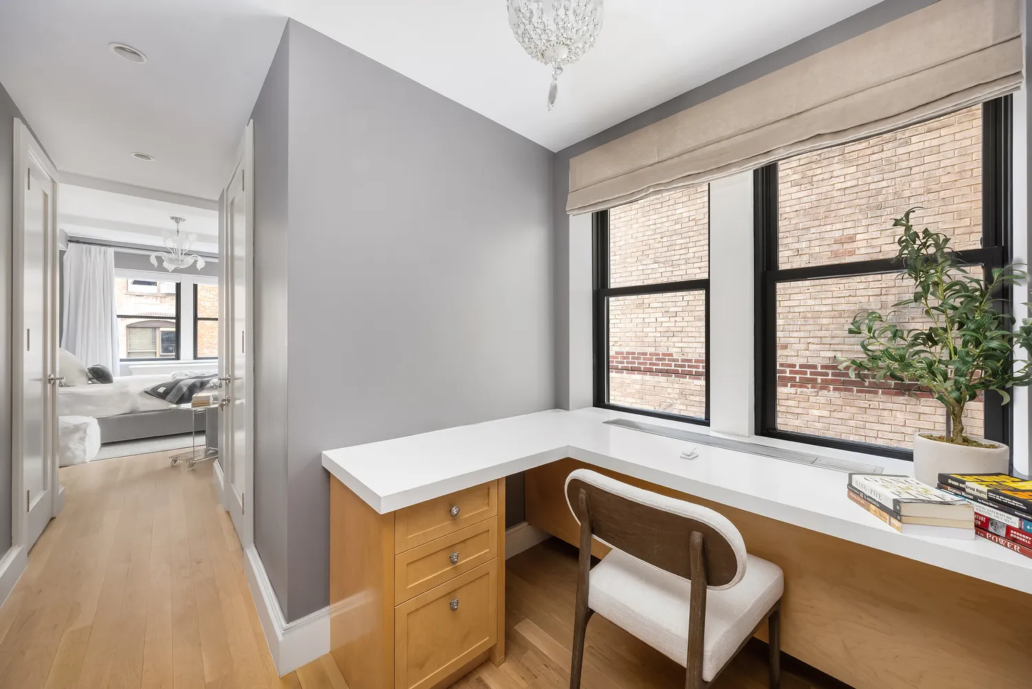 a bathroom with double vanity and a bathtub