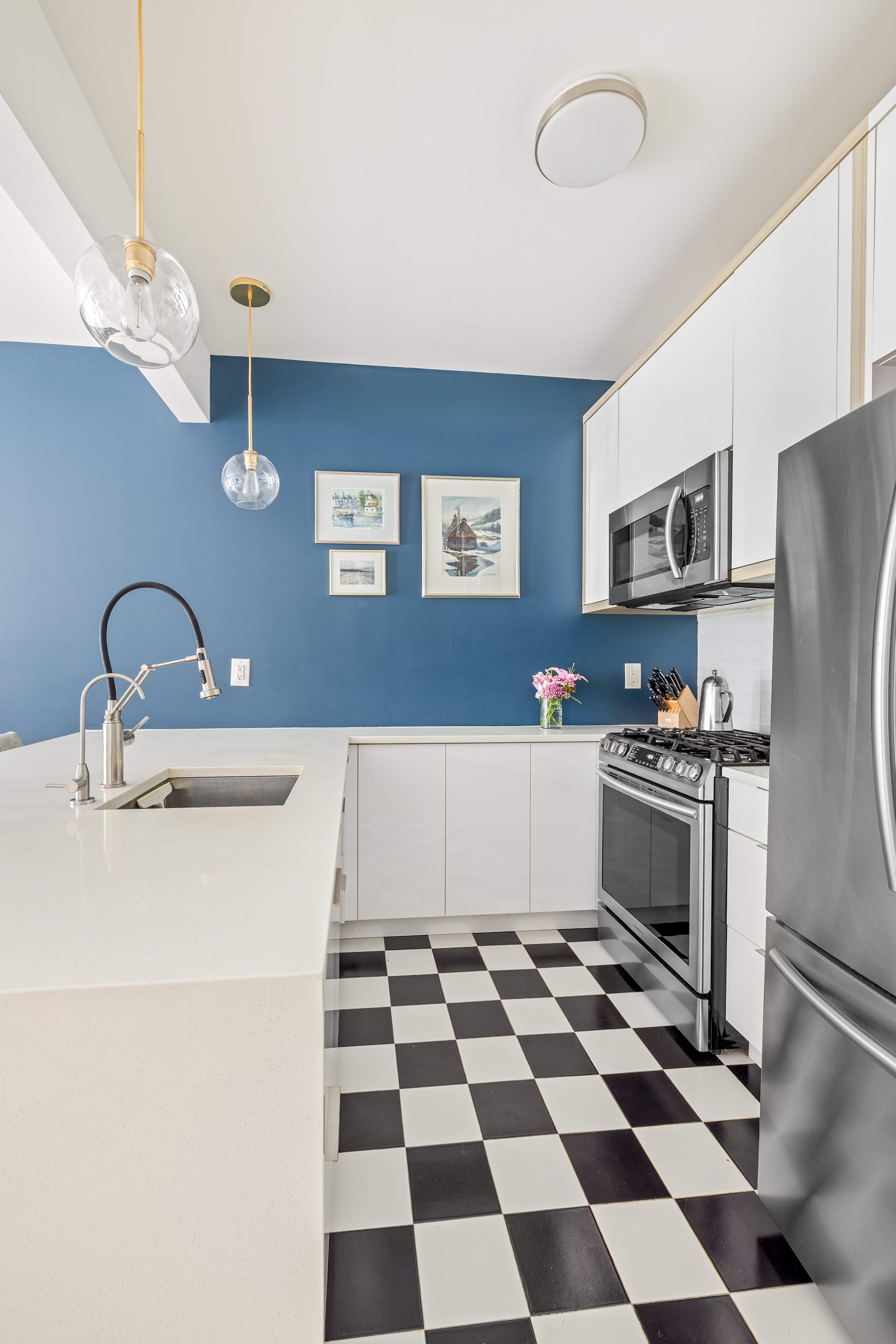 1204 Saint Marks Avenue, Unit 4R Brooklyn, NY 11213 - Photo 5 of 14 a kitchen with a refrigerator a sink and a stove top oven