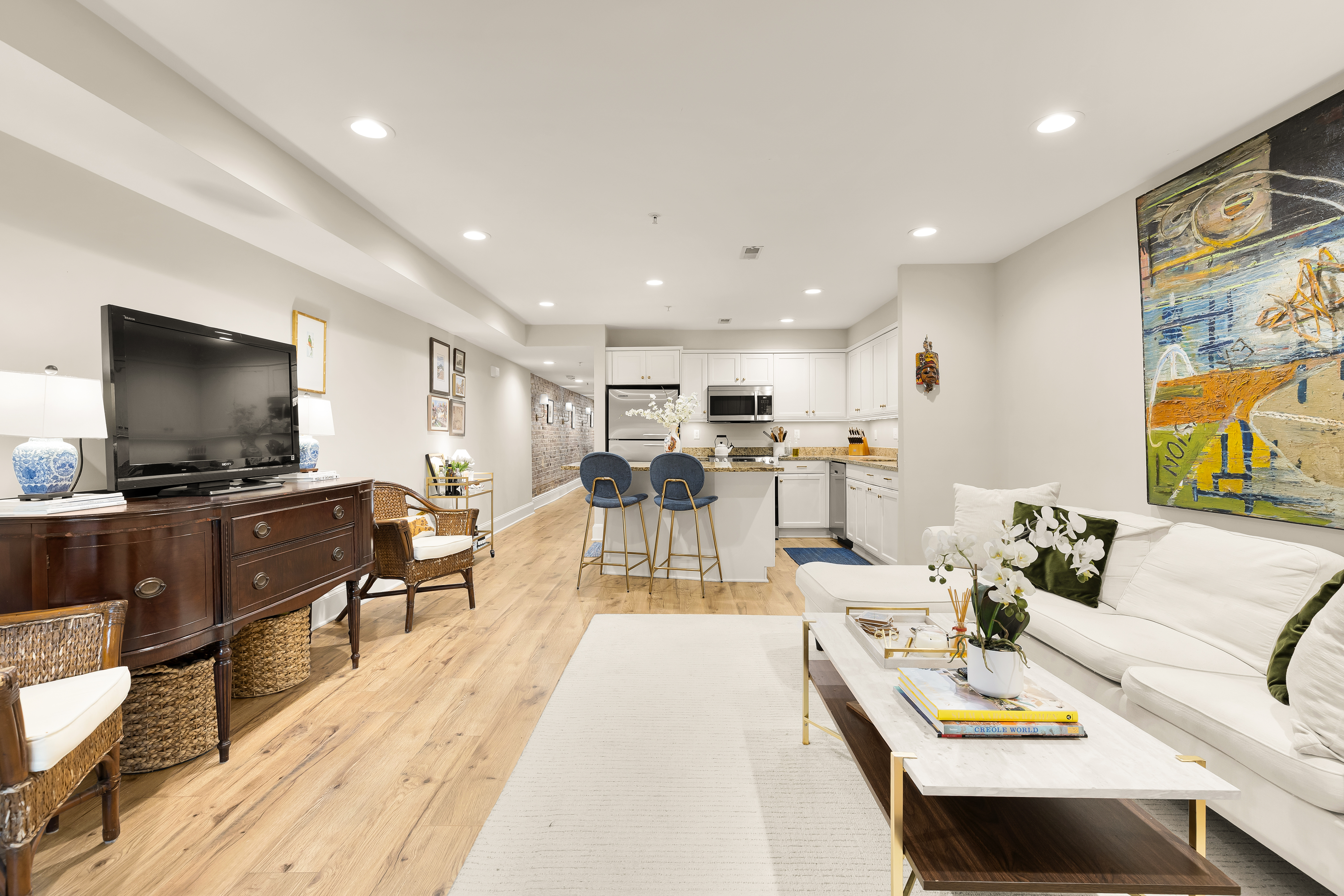 1354 Kenyon Street Northwest, Unit G Washington, DC 20010 - Photo 5 of 35 a living room with furniture and a flat screen tv