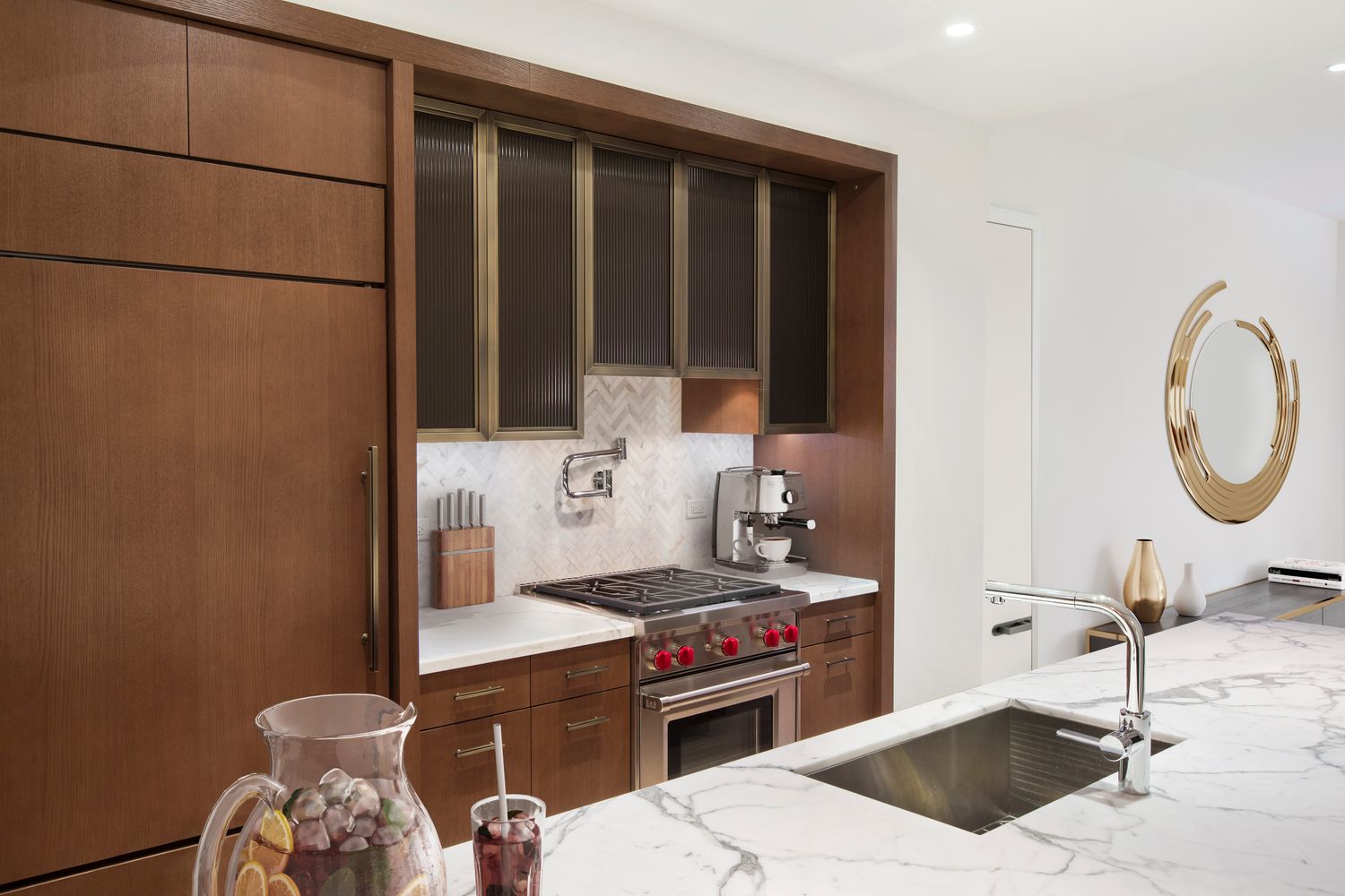 100 Barclay Street, Unit 17H Manhattan, NY 10007 - Photo 5 of 11 a kitchen with a sink and a stove top oven