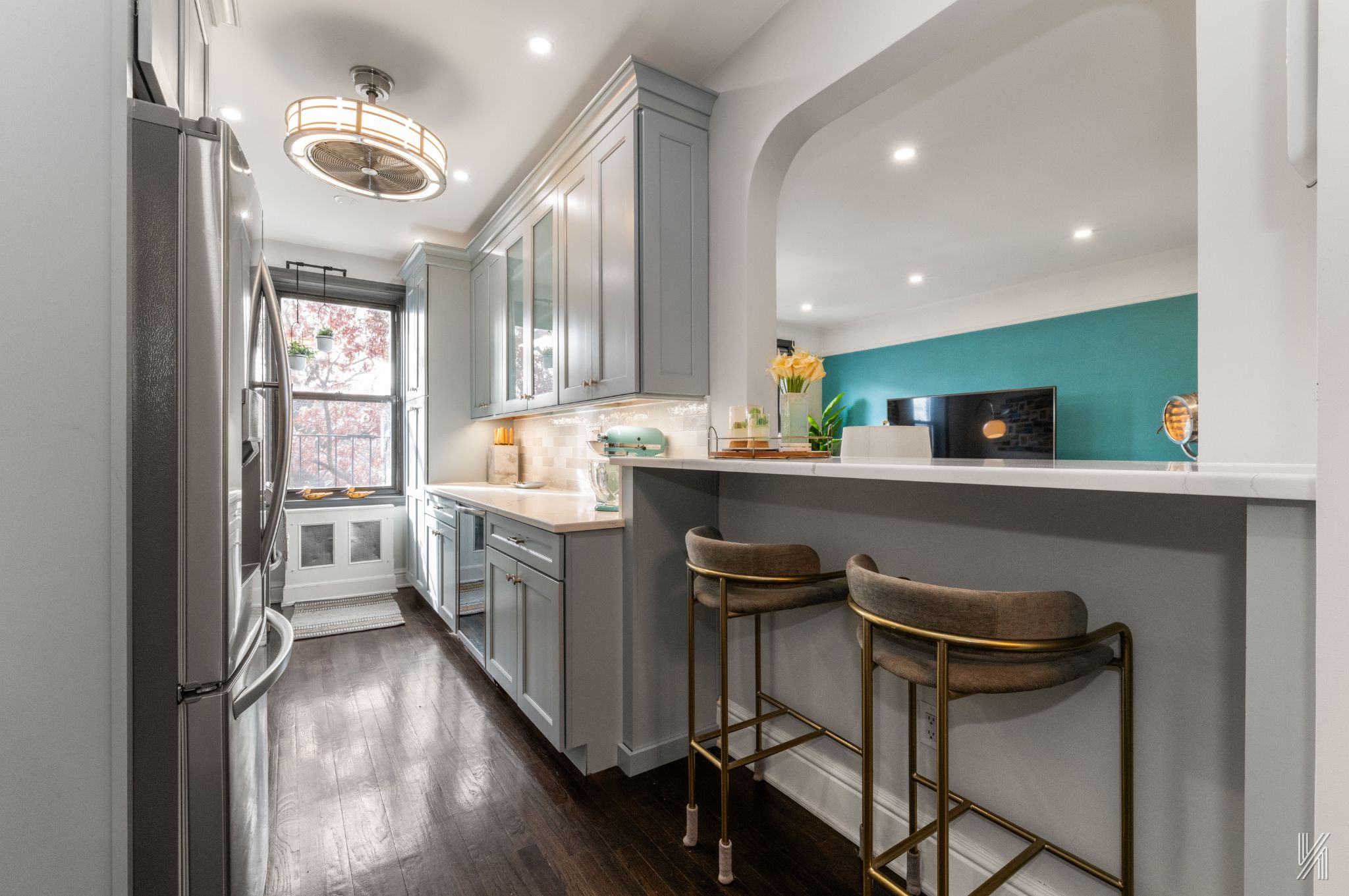 35-06 88th Street, Unit 3G Queens, NY 11372 - Photo 5 of 20 a kitchen with a sink cabinets and window