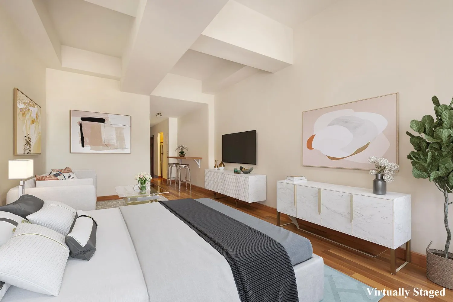 a bedroom with a bed and a flat screen tv